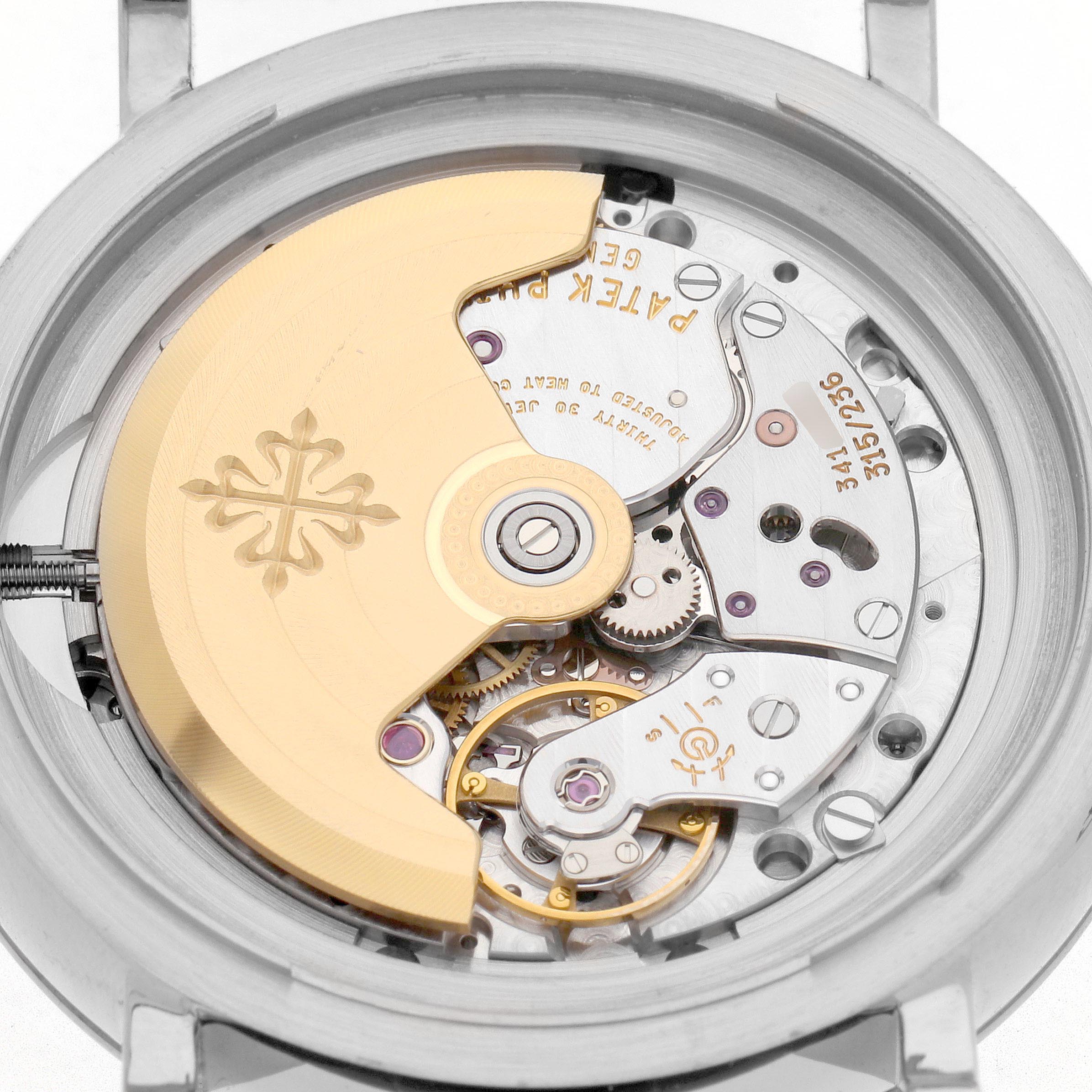 The image shows the movement and rotor of a Patek Philippe Complications 5159G-001 Men's White Gold Silver Dial 5159G-001 Men's White Gold Silver Dial watch from the back angle.