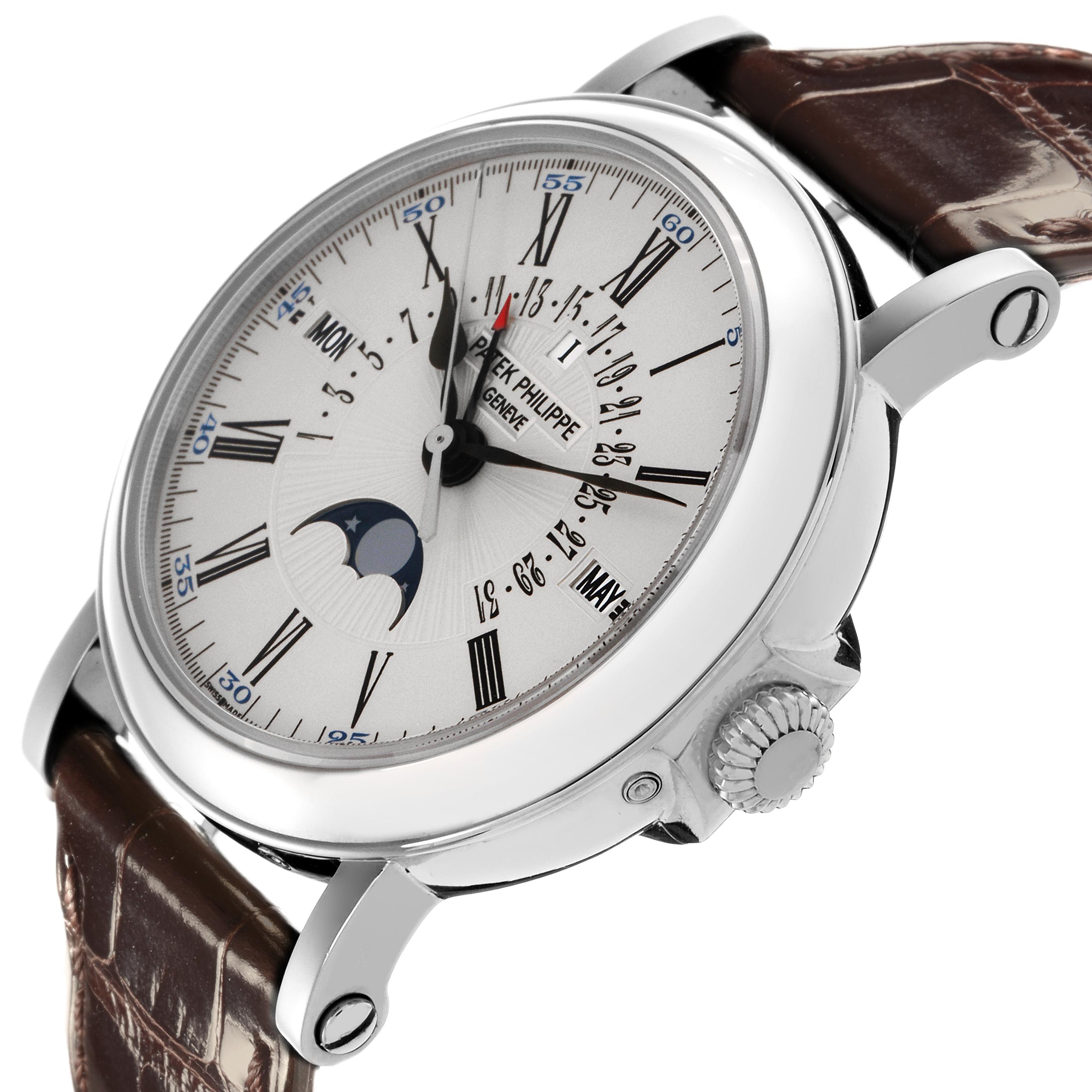 The Patek Philippe Complications 5159G-001 Men's White Gold Silver Dial 5159G-001 Men's White Gold Silver Dial watch is shown from a three-quarter side angle, highlighting the dial, crown, and part of the leather strap.