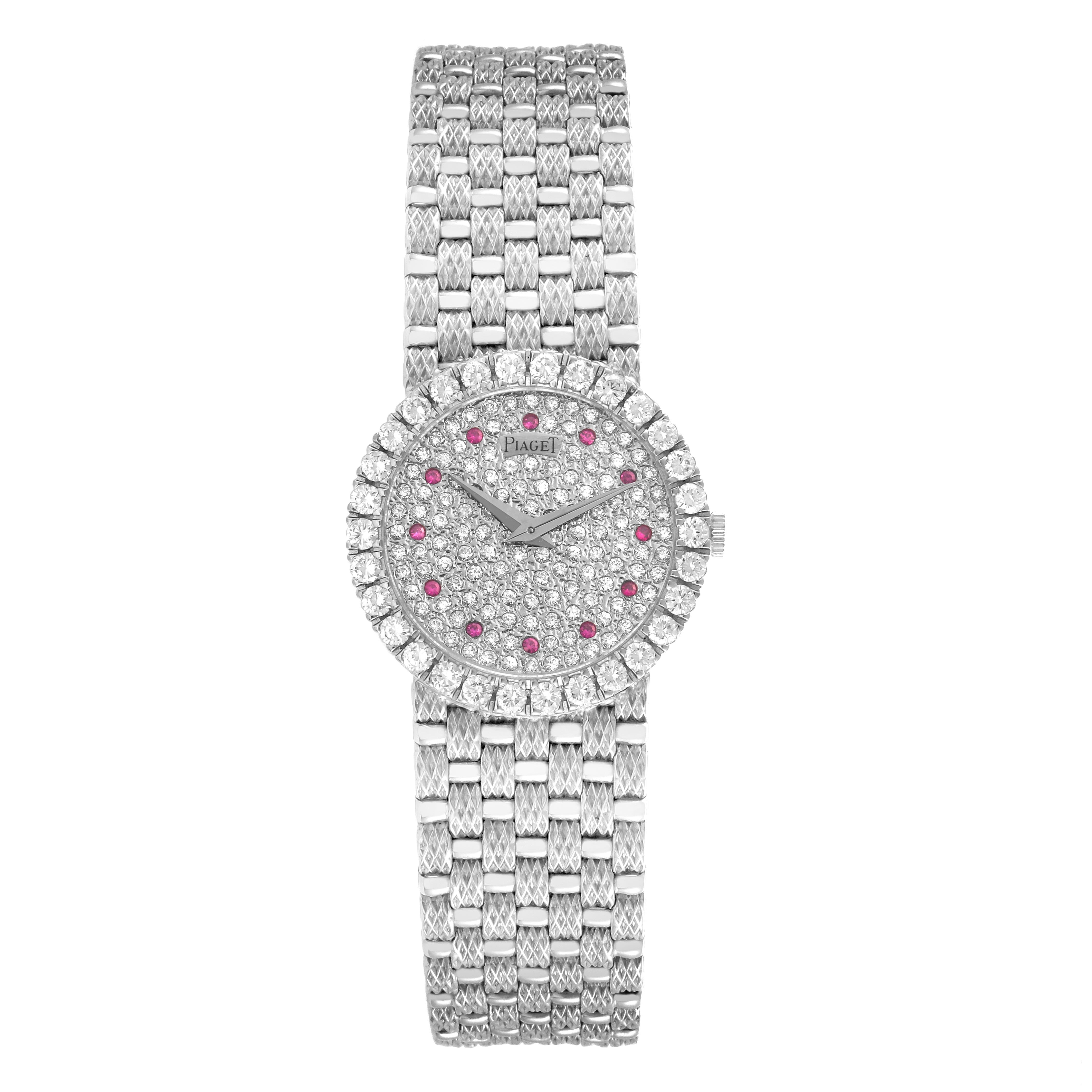 The Piaget 9190D23 Women
s White Gold Silver Dial 9190D23 Women
s White Gold Silver Dial Tradition White Gold Diamond Ruby Ladies Watch 9190D23 is shown from a top-down angle, displaying its face and bracelet.