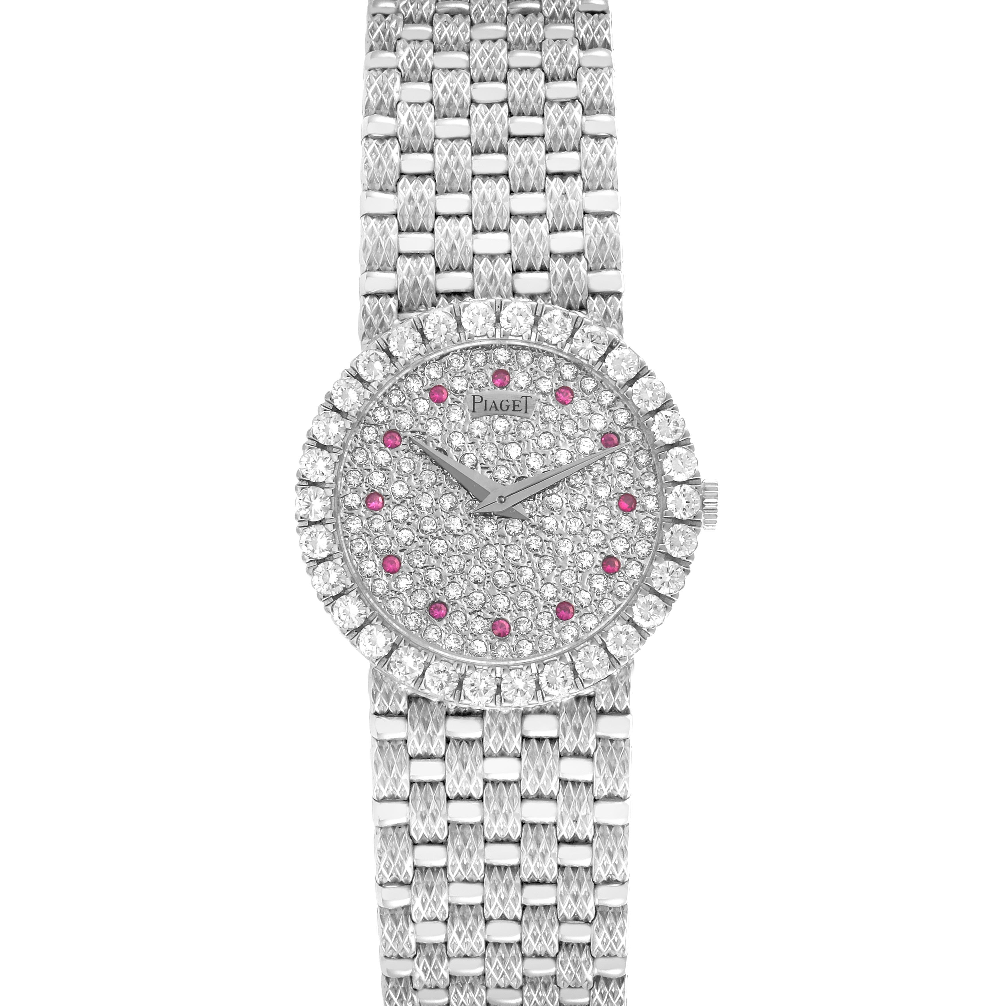 The Piaget 9190D23 Women
s White Gold Silver Dial 9190D23 Women
s White Gold Silver Dial Tradition 9190D23 watch is shown from the front, highlighting its diamond and ruby-encrusted face and bracelet.