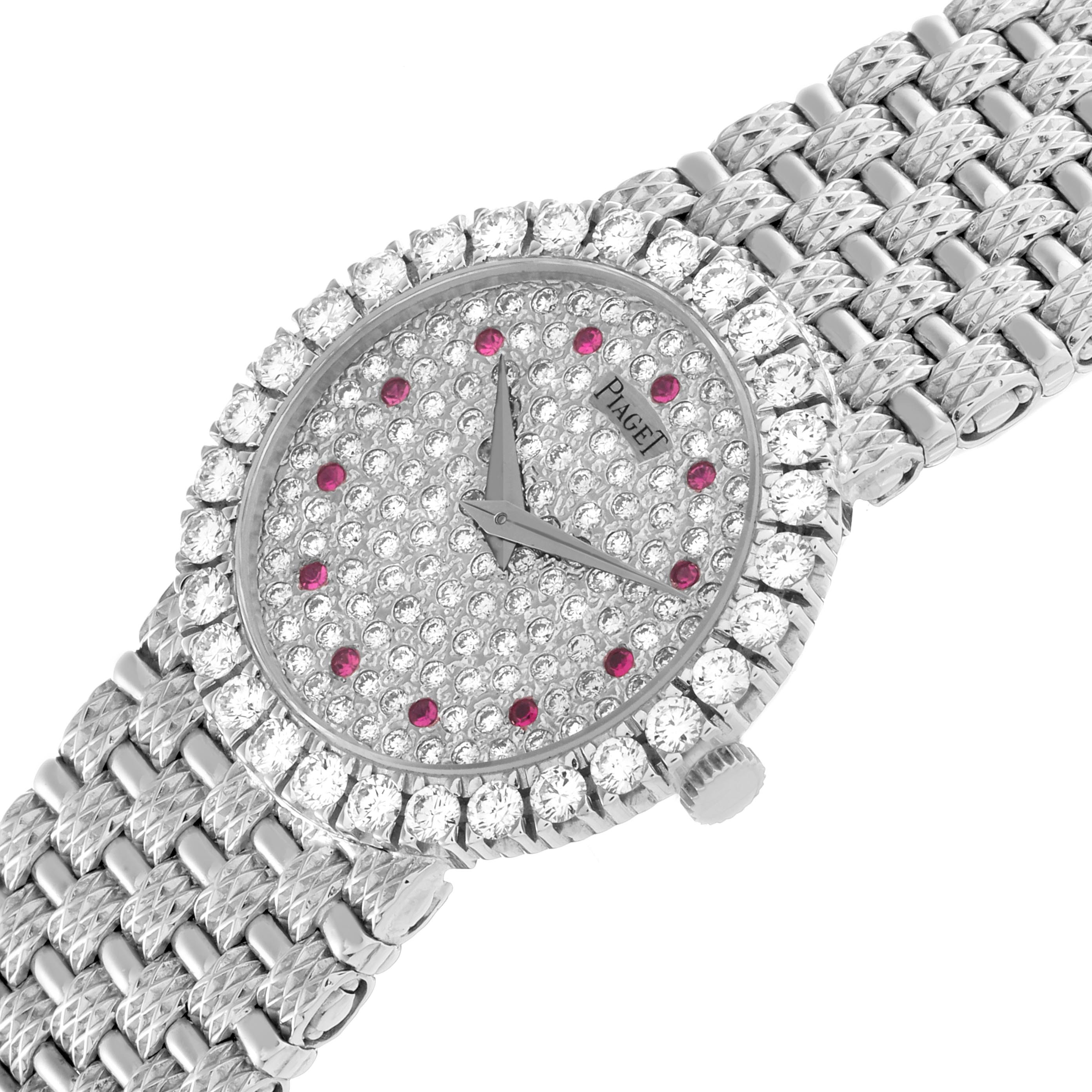 The Piaget 9190D23 Women
s White Gold Silver Dial 9190D23 Women
s White Gold Silver Dial Tradition White Gold Diamond Ruby Ladies Watch 9190D23 is shown at an angled view, highlighting the diamond-studded face and bracelet.