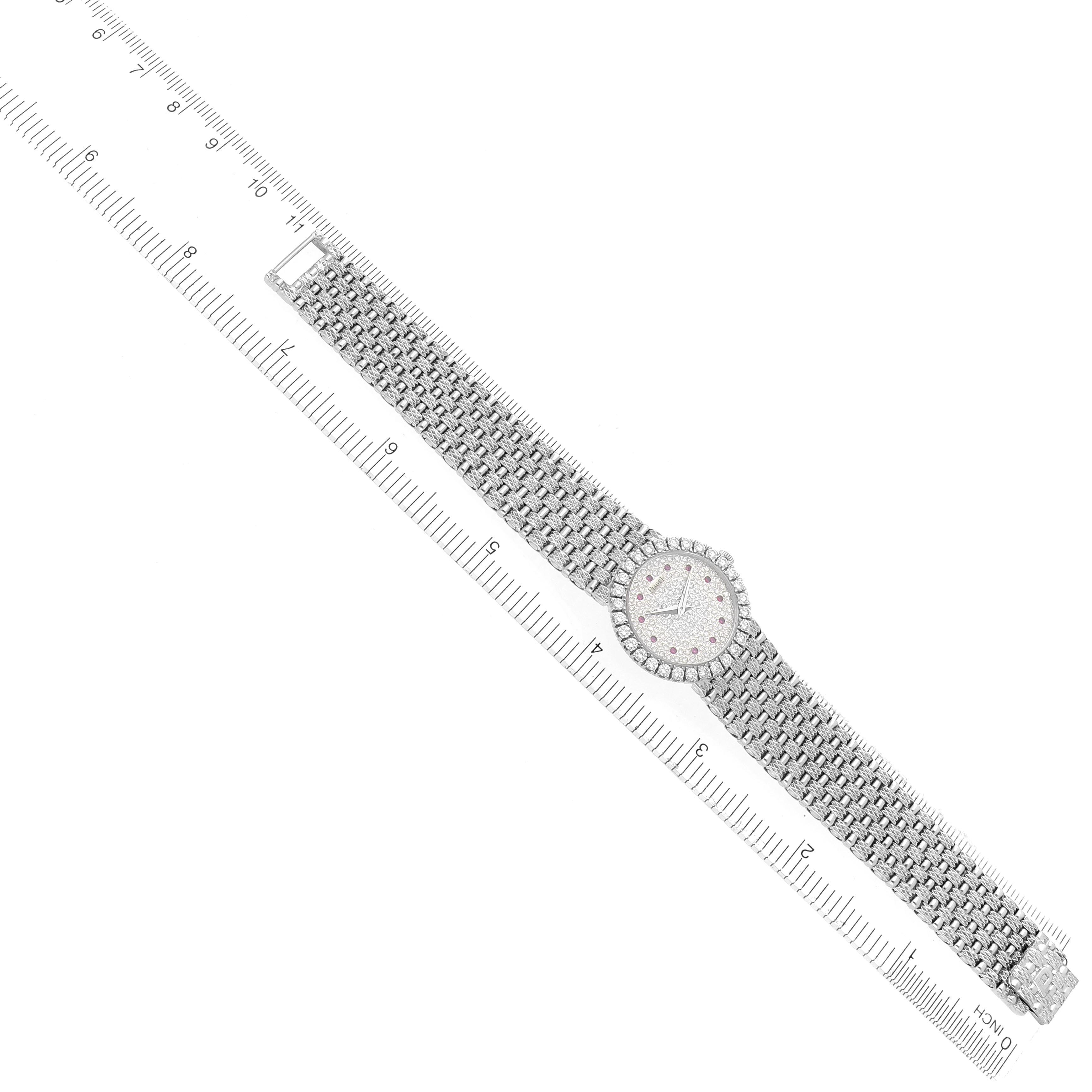 The Piaget 9190D23 Women
s White Gold Silver Dial 9190D23 Women
s White Gold Silver Dial Tradition White Gold Diamond Ruby Ladies Watch 9190D23 is shown at a top-down angle with a full view of the face and bracelet.