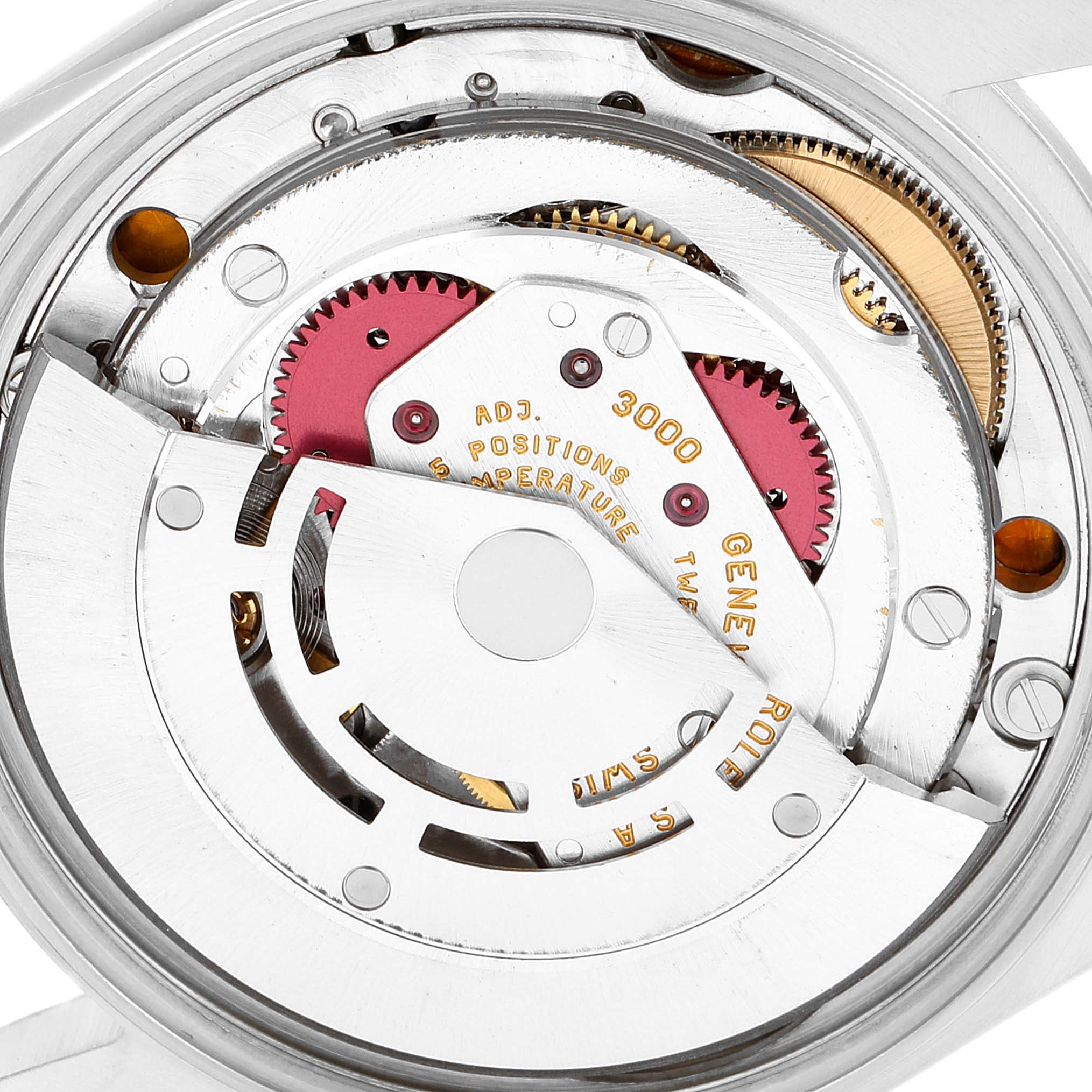 This close-up image shows the internal movement mechanism of a Rolex Air-King 14000 Men's Stainless Steel Blue Dial 14000 Men's Stainless Steel Blue Dial watch, highlighting the gears and intricate components.