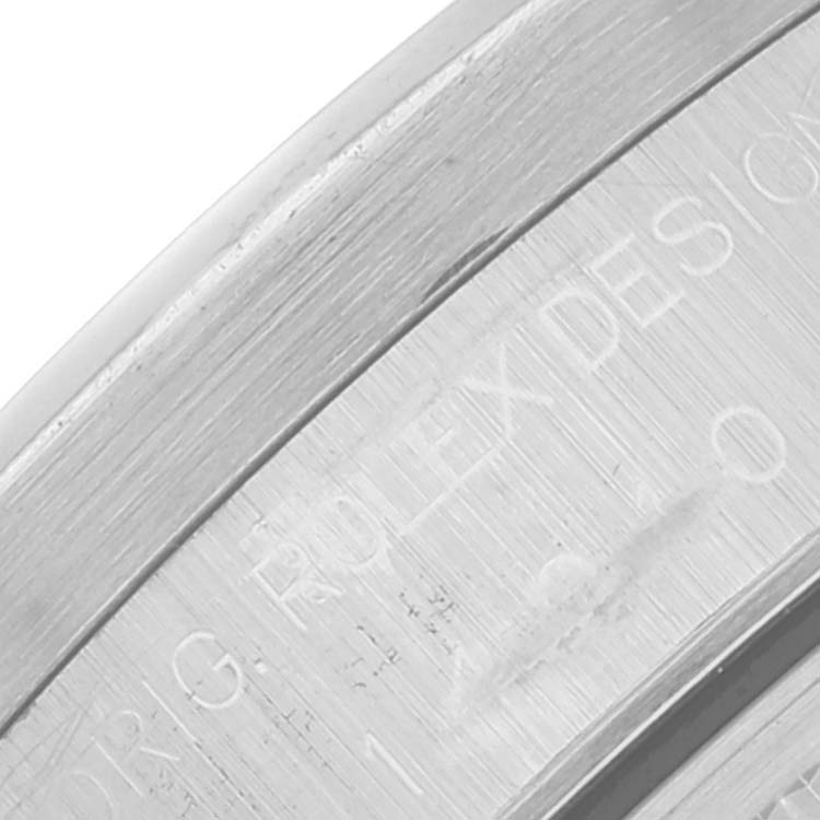 This close-up image shows the engraved inner bezel of a Rolex Air-King 14010 Men's Stainless Steel Blue Dial 14010 Men's Stainless Steel Blue Dial watch.