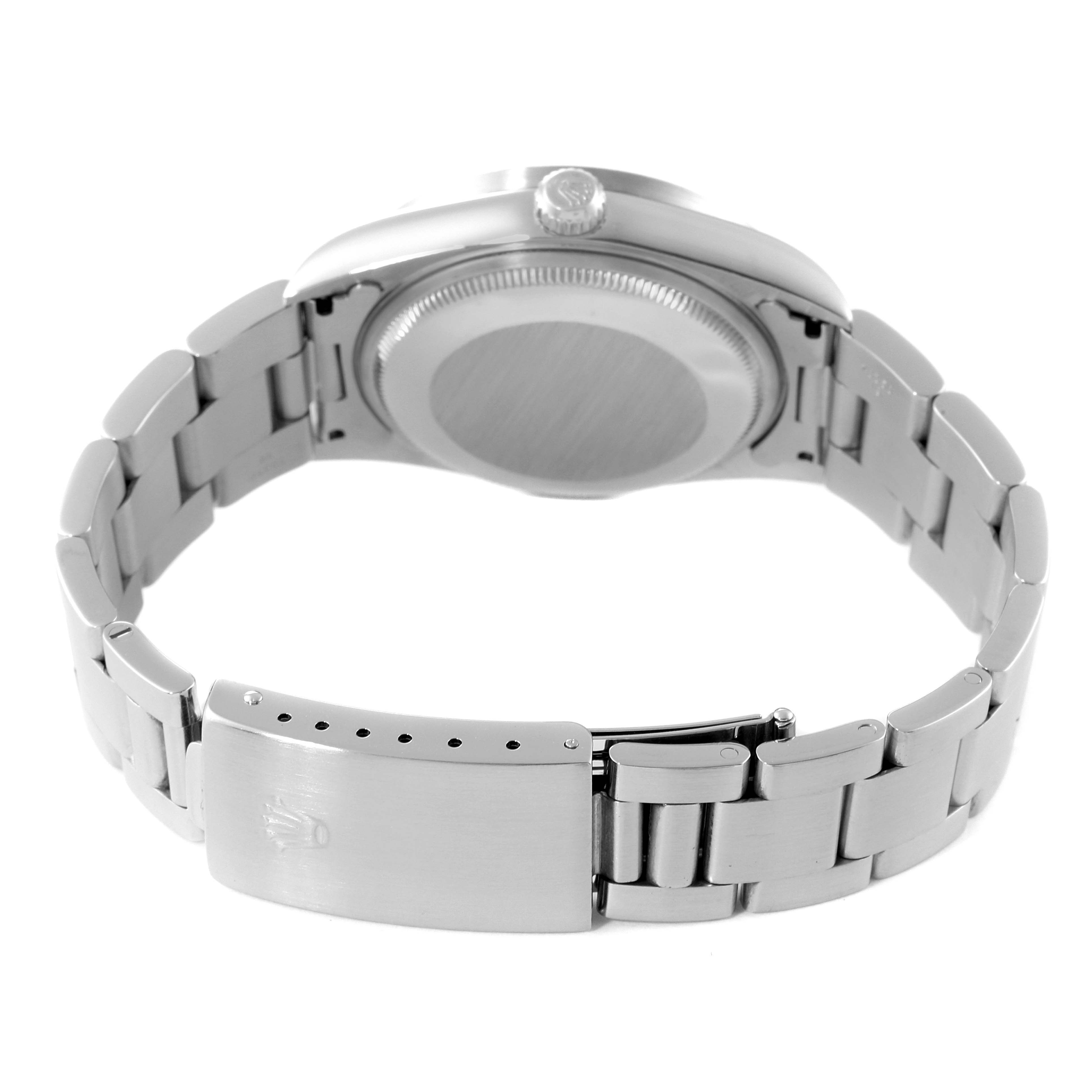 This image shows the back view of the Rolex Air-King 14010 Men's Stainless Steel White Dial 14010 Men's Stainless Steel White Dial, including its case back, crown, and bracelet clasp.