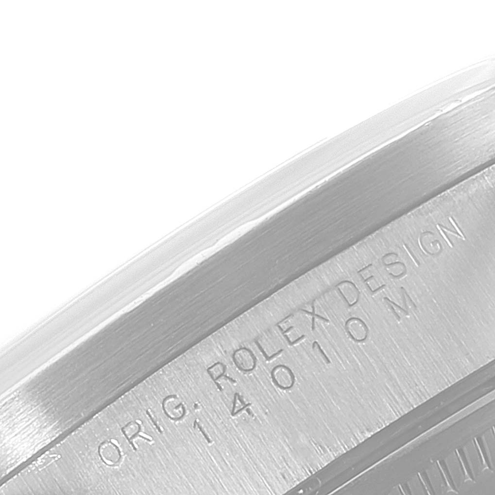 The image shows the side engraving on the case of a Rolex Air-King 14010 Men's Stainless Steel White Dial 14010 Men's Stainless Steel White Dial watch, showing the model and design details.