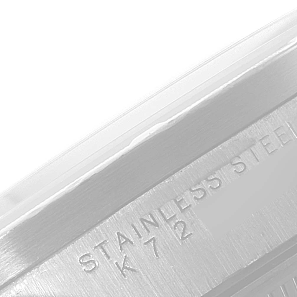 The image shows a close-up angle of the case back of the Rolex Air-King 14010 Men's Stainless Steel White Dial 14010 Men's Stainless Steel White Dial watch, highlighting the "STAINLESS STEEL" engraving.