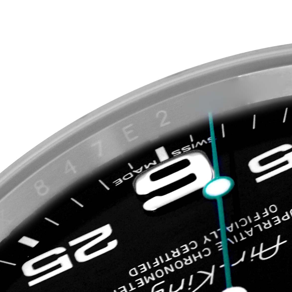 This image shows a close-up of the Rolex Air-King 116900 Men
s Stainless Steel Black Dial 116900 Men
s Stainless Steel Black Dial watch, focusing on part of the dial with numerals and the minute hand.