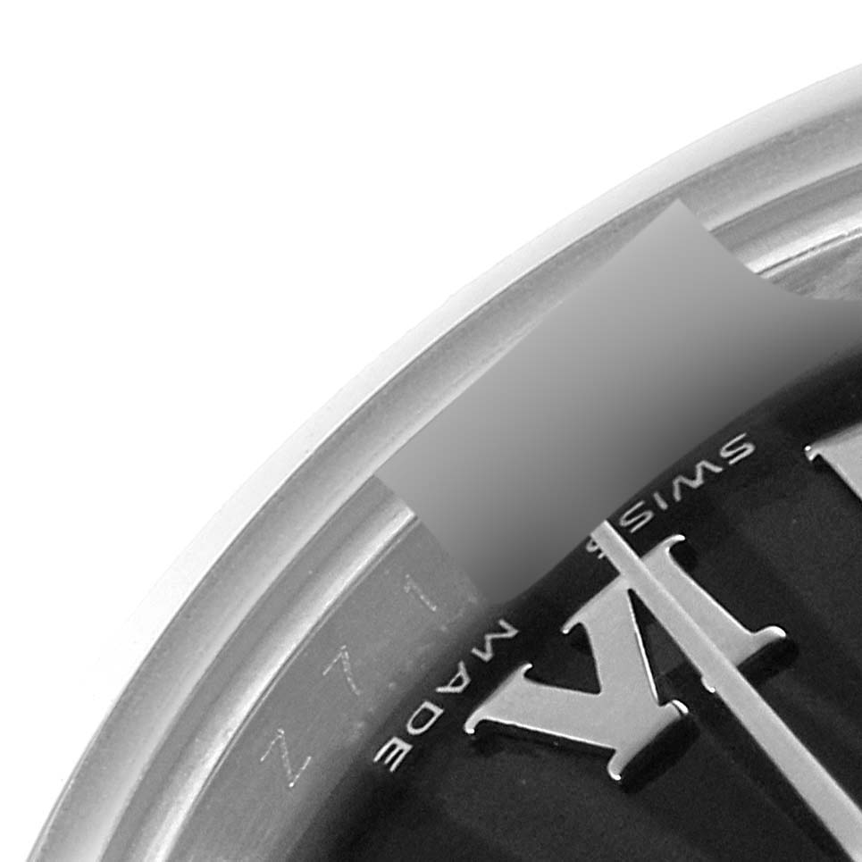 This image shows a close-up of the dial and bezel of a Rolex Datejust 179160 Women's Stainless Steel Black Dial 179160 Women's Stainless Steel Black Dial watch with visible Roman numerals and the "Swiss Made" label.
