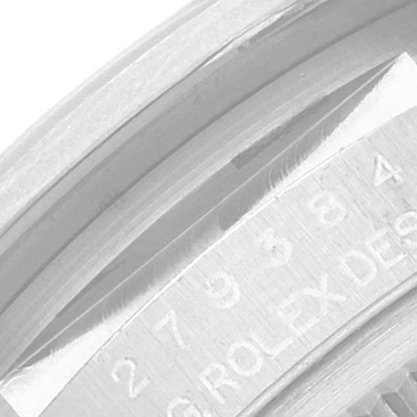 The image shows a close-up of the serial number and "ROLEXDESIGN" engraving on the inner bezel of a Rolex Datejust 279384 Women's Stainless Steel Mother of Pearl Dial 279384 Women's Stainless Steel Mother of Pearl Dial watch.