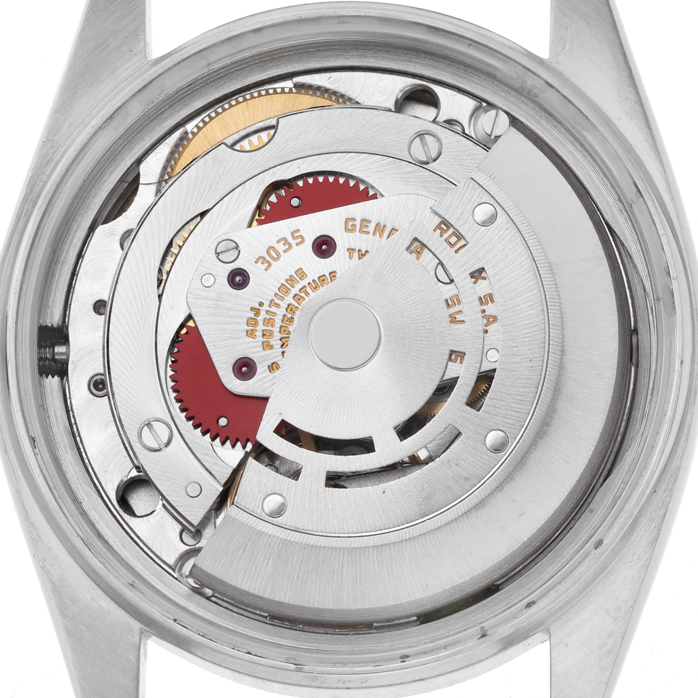 The image shows the internal mechanism of a Rolex Datejust 68084 Men
s Stainless Steel Silver Dial 68084 Men
s Stainless Steel Silver Dial watch from a top-down angle, highlighting its movement components.