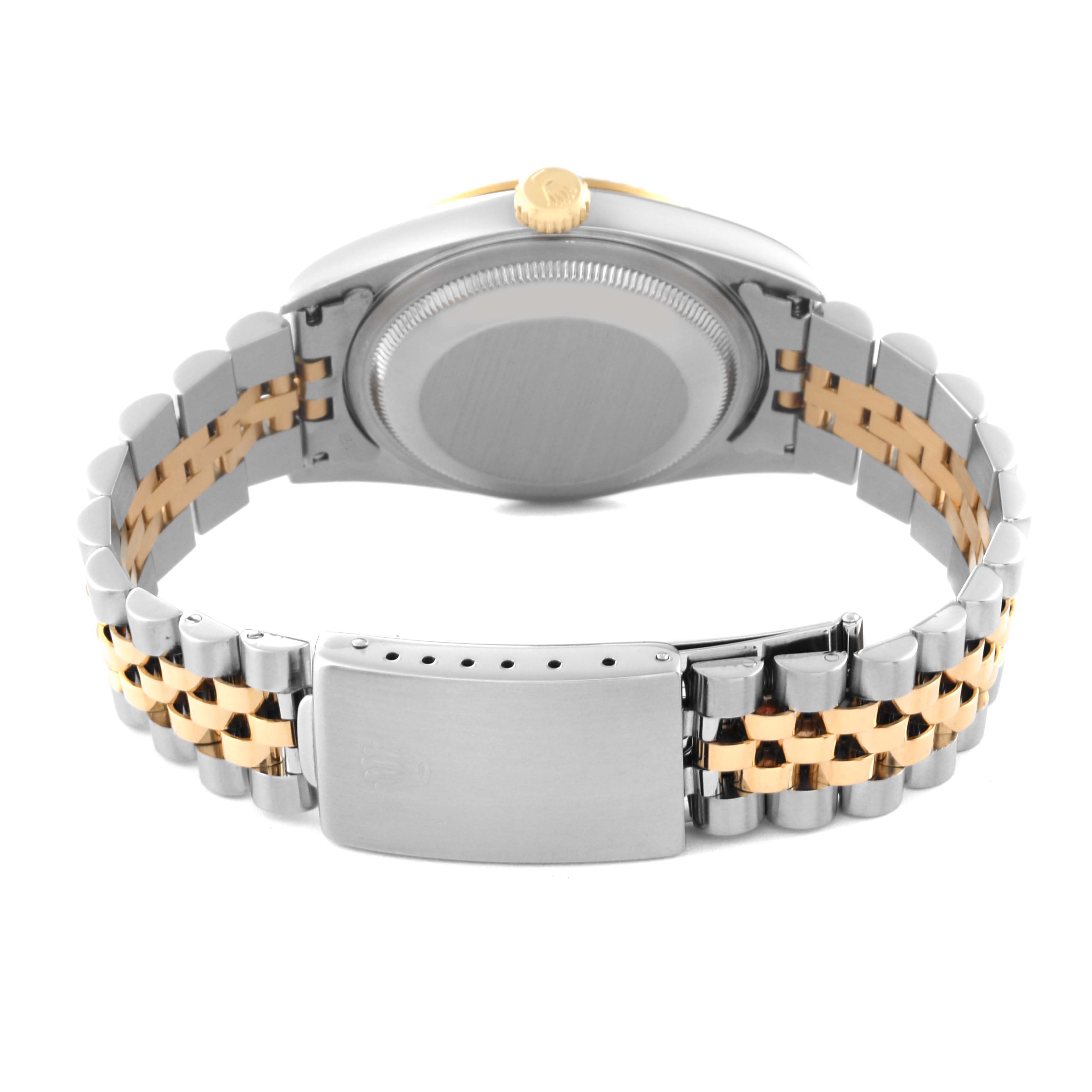 This image shows the back and bracelet of the Rolex Datejust 16233 Men's Steel and Gold (two tone) Black Dial 16233 Men's Steel and Gold (two tone) Black Dial watch, featuring a two-tone metal design.