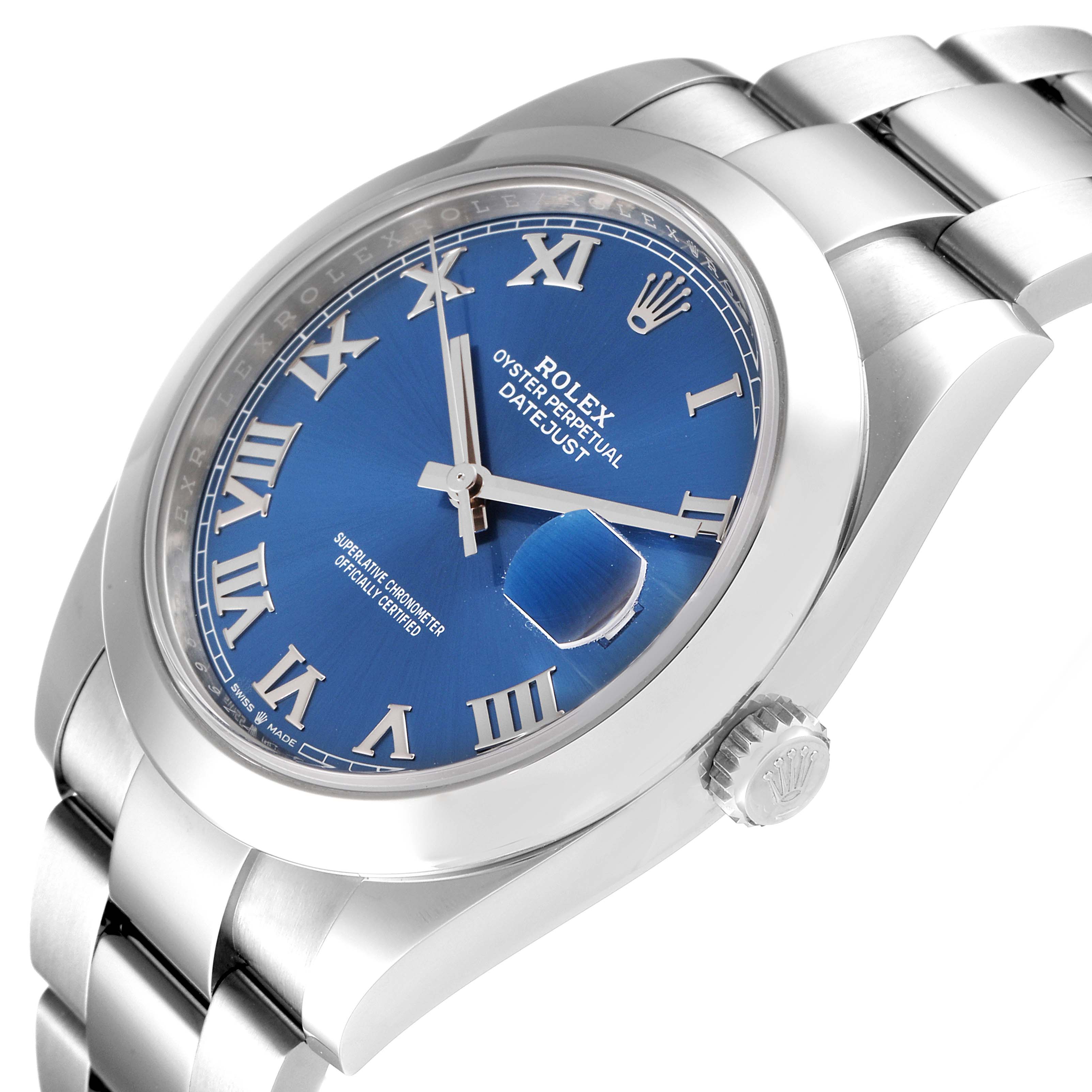 The image shows a Rolex Datejust 41 126300 Men's Stainless Steel Blue Dial 126300 Men's Stainless Steel Blue Dial with a blue dial, Roman numerals, and a partial view of its stainless steel bracelet from an angled top perspective.