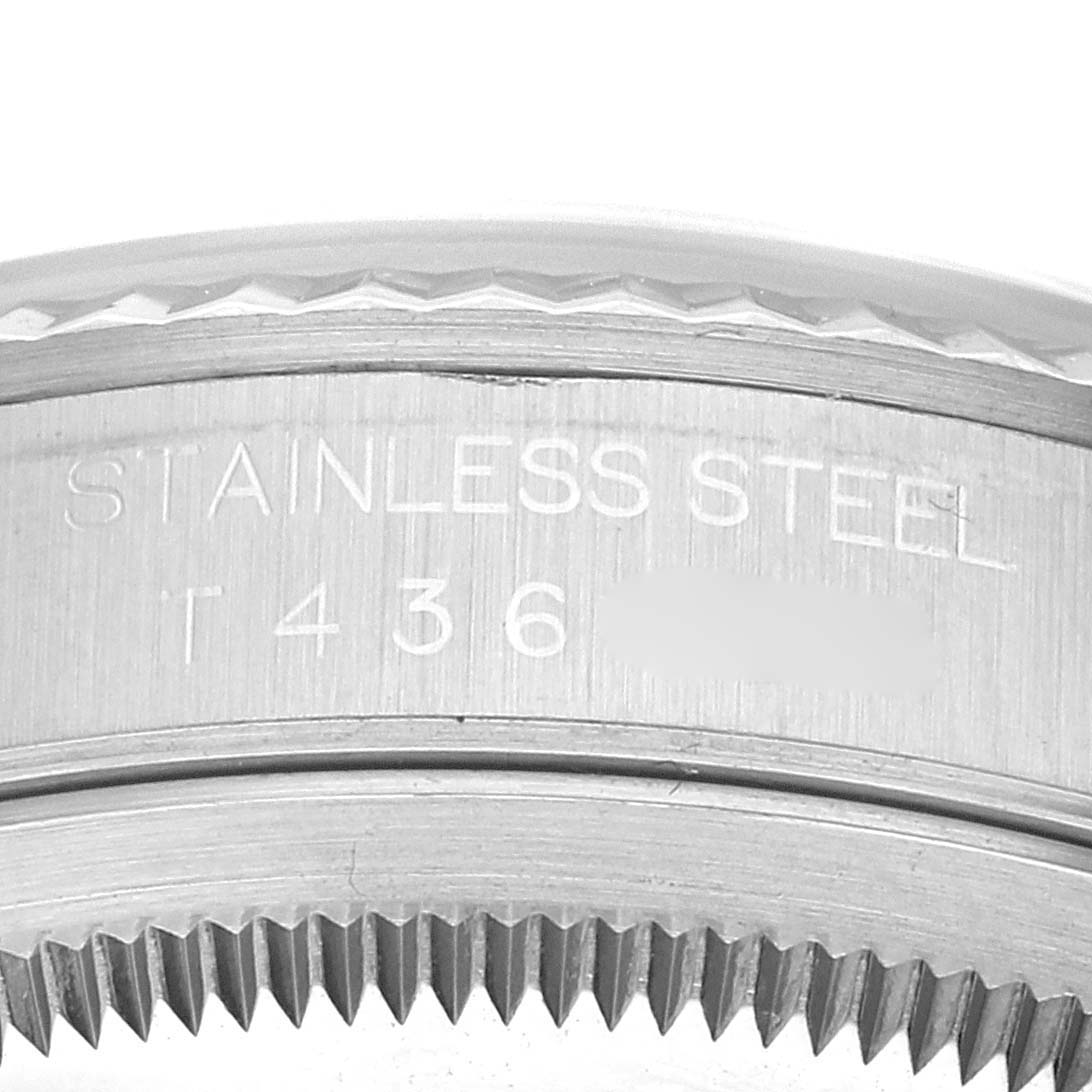 This image shows a close-up angle of the stainless steel case back of a Rolex Datejust 16234 Men's Stainless Steel Blue Dial 16234 Men's Stainless Steel Blue Dial watch.