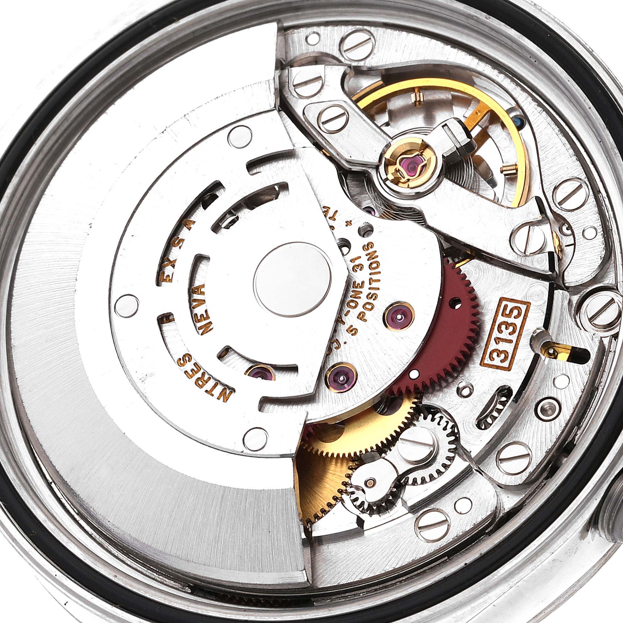 The image shows an internal view of the Rolex Datejust 16234 Men's Stainless Steel Blue Dial 16234 Men's Stainless Steel Blue Dial watch movement, highlighting gears, rotors, and other mechanical components.