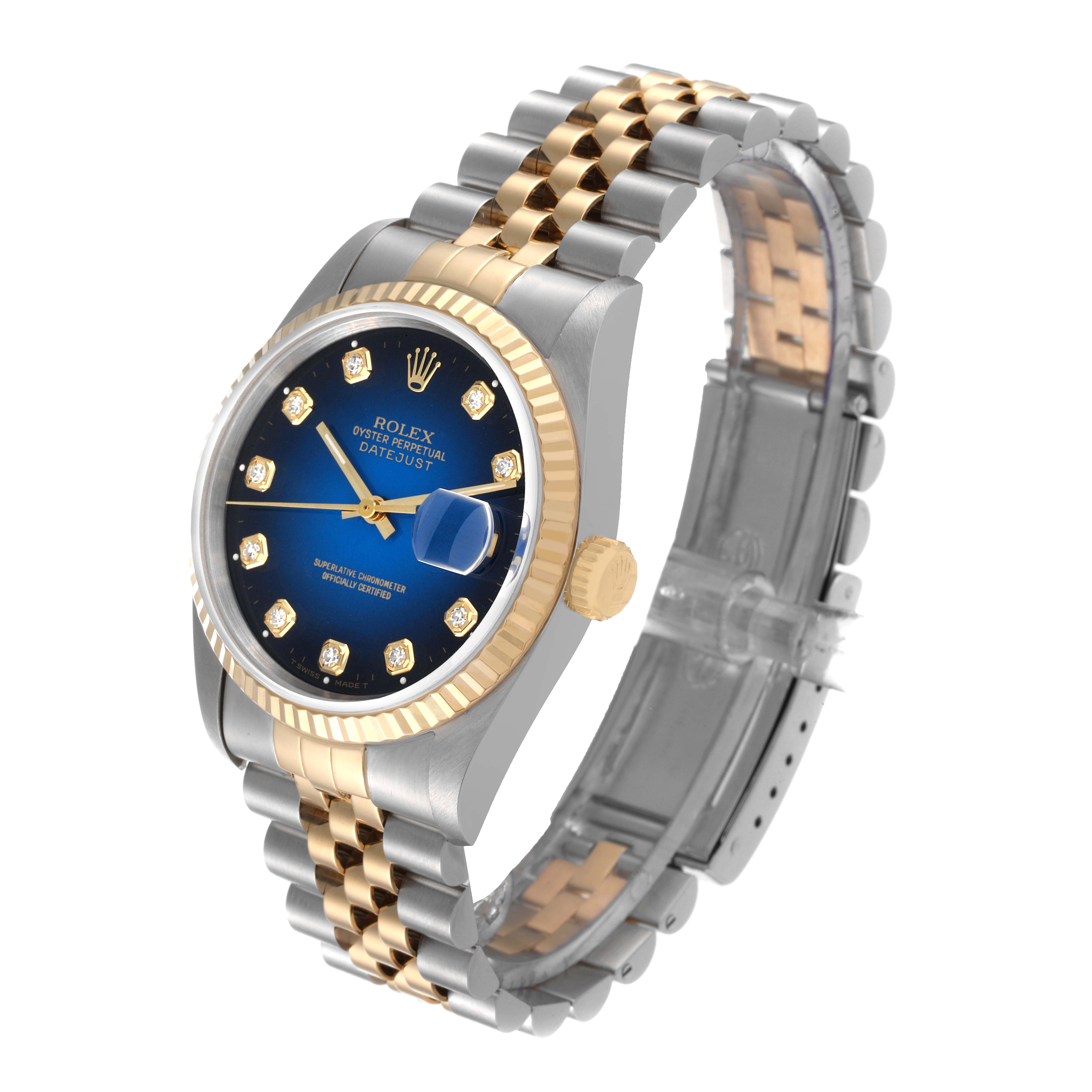 The Rolex Datejust 16233 Men's Steel and Gold (two tone) Blue Dial 16233 Men's Steel and Gold (two tone) Blue Dial watch is shown at a three-quarter angle, highlighting its two-tone bracelet and blue dial with diamond hour markers.