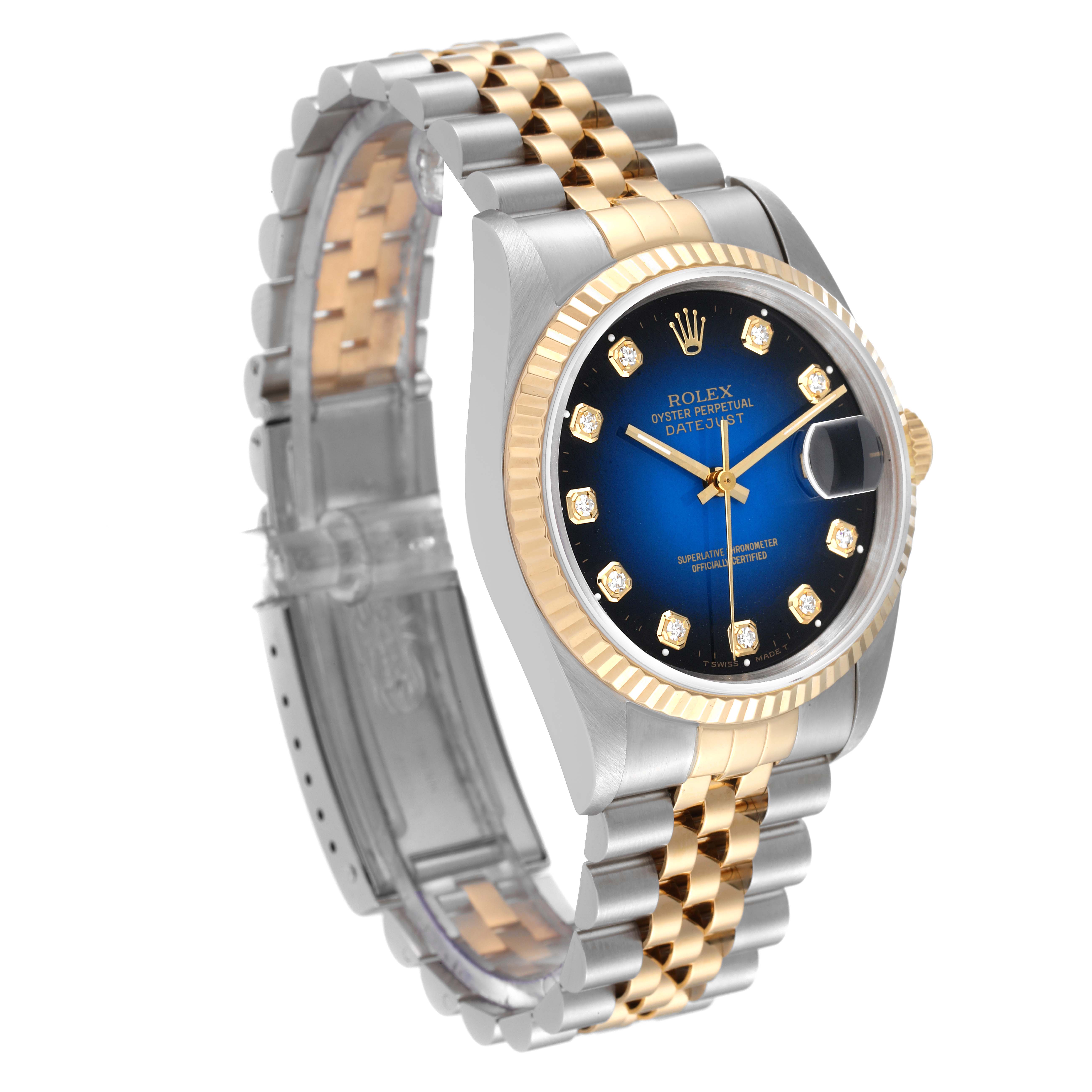 The Rolex Datejust 16233 Men's Steel and Gold (two tone) Blue Dial 16233 Men's Steel and Gold (two tone) Blue Dial watch is shown at an angled view, highlighting its two-tone bracelet, fluted bezel, and blue dial with diamond markers.