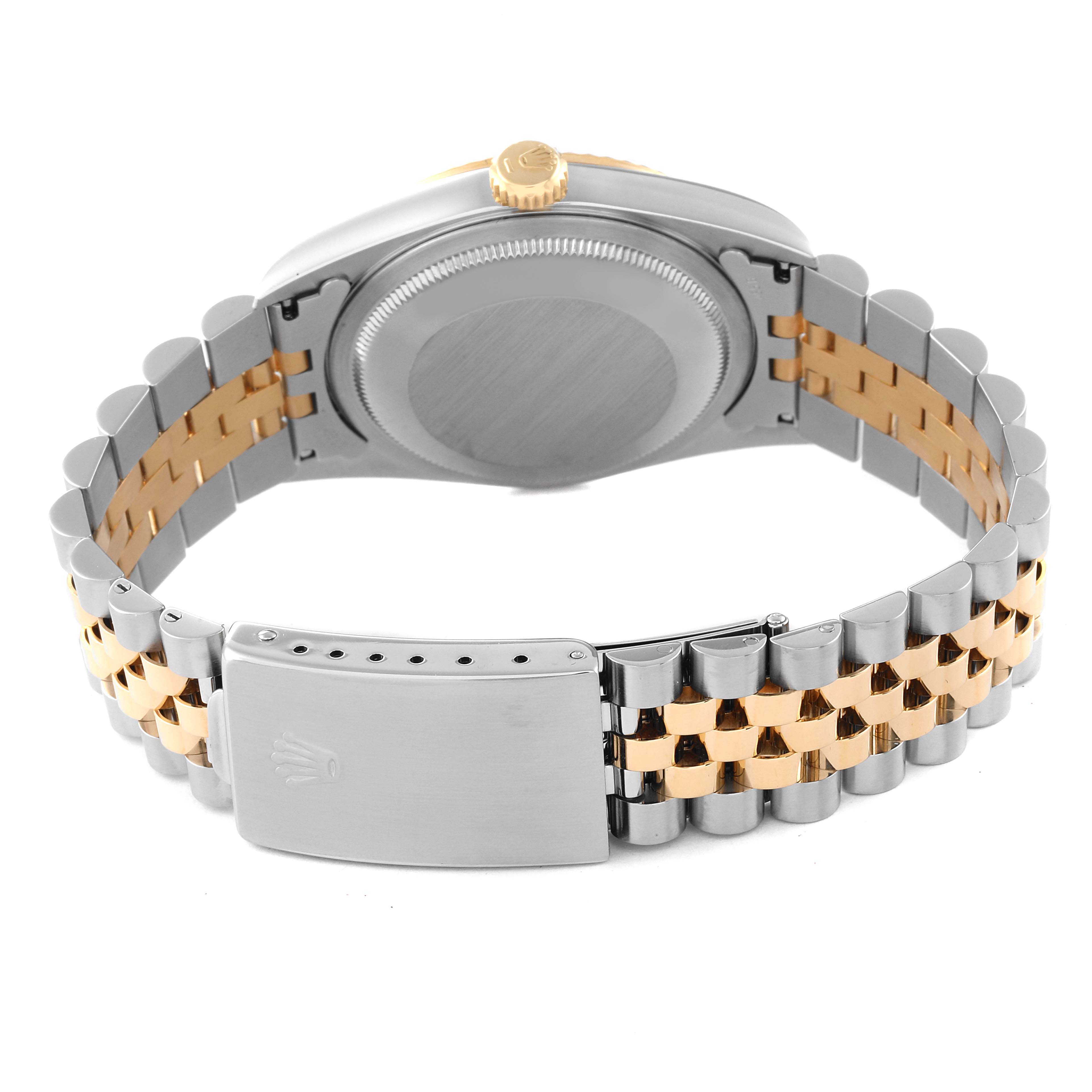 The image shows the back of a Rolex Datejust 16233 Men's Steel and Gold (two tone) Blue Dial 16233 Men's Steel and Gold (two tone) Blue Dial watch, featuring the case back and a two-tone Jubilee bracelet with a clasp.