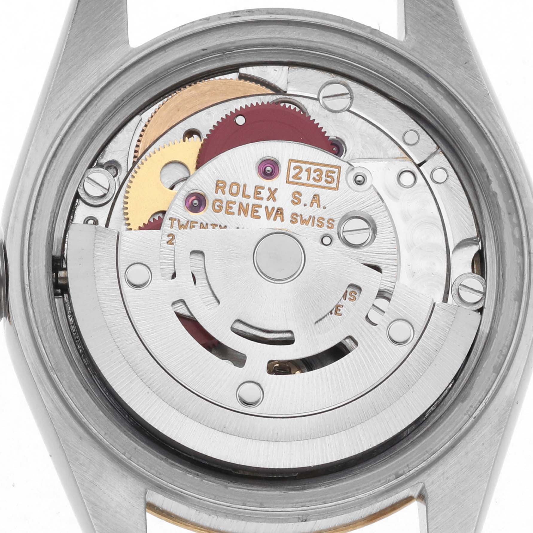 The image shows the movement of a Rolex Datejust 69173 Women
s Steel and Gold (two tone) Champagne Dial 69173 Women
s Steel and Gold (two tone) Champagne Dial, viewed from the back revealing gears and the rotor.