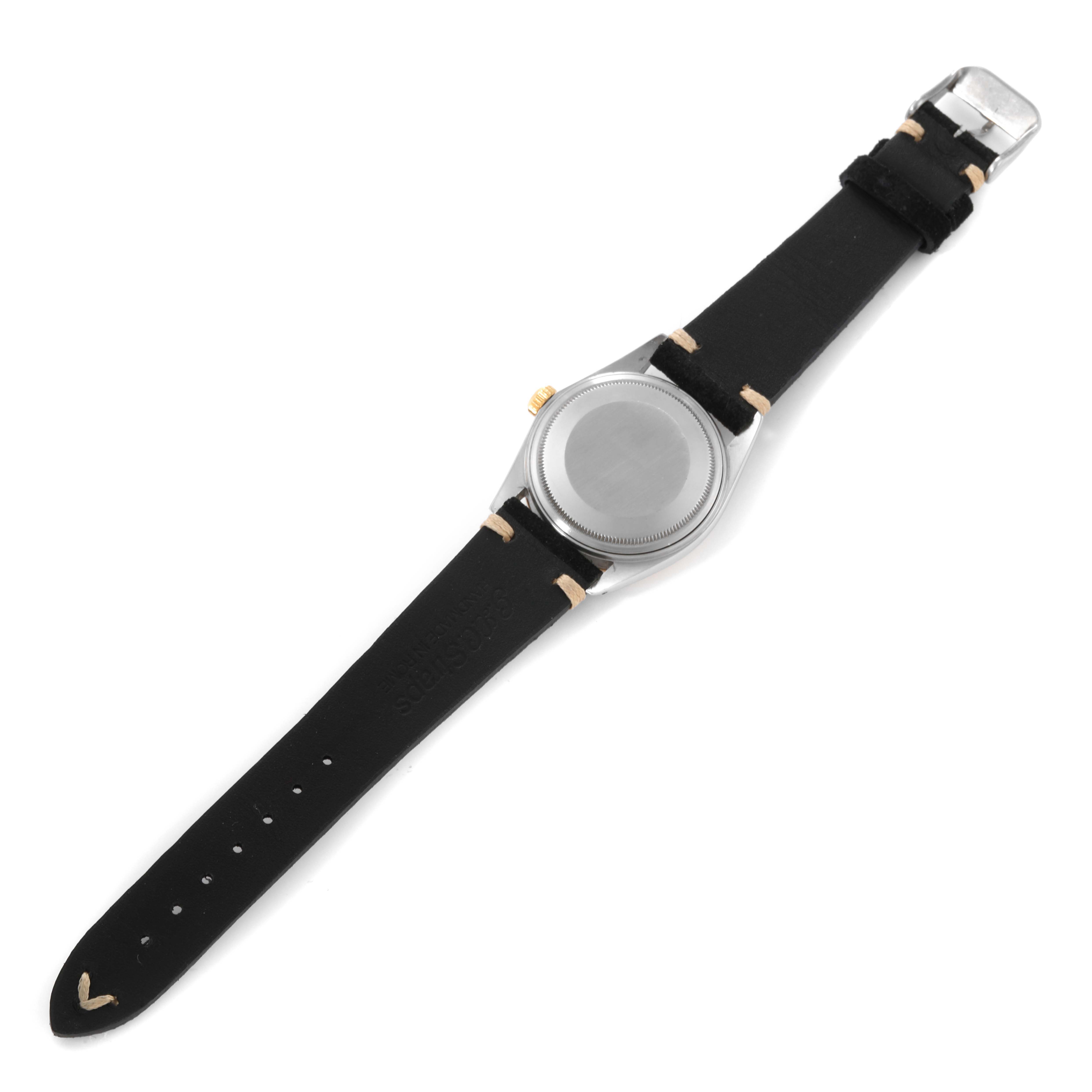 This image shows the back view of the Rolex Vintage Collection 16013 Men's Steel and Gold (two tone) Champagne Dial 16013 Men's Steel and Gold (two tone) Champagne Dial model watch, featuring its strap and case back.