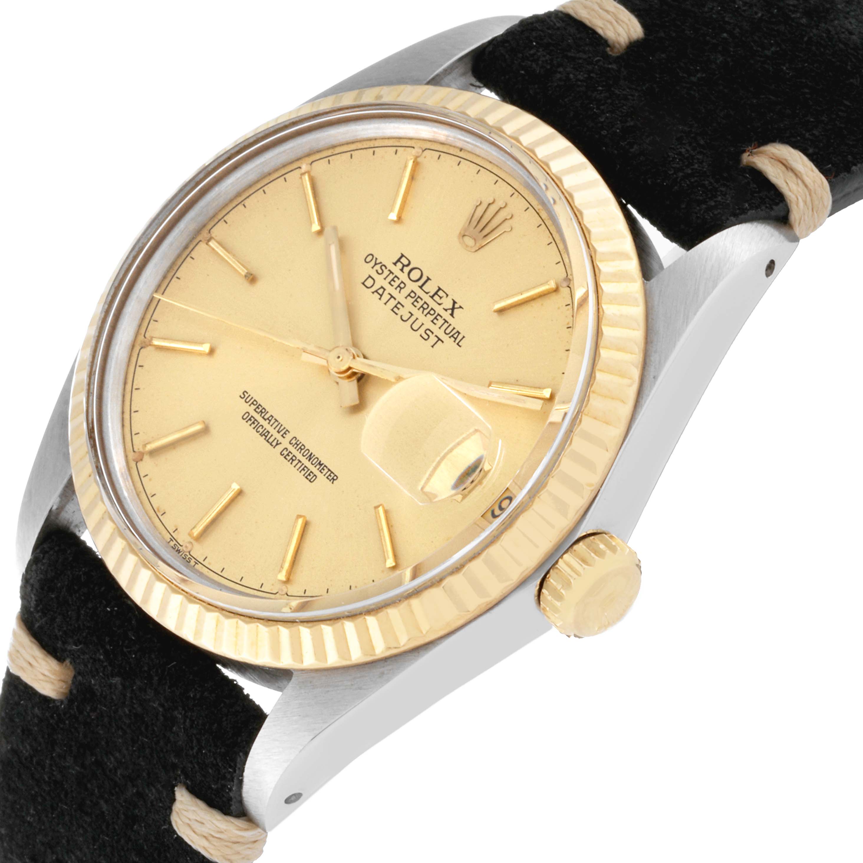 This is a close-up image of the Rolex Vintage Collection 16013 Men's Steel and Gold (two tone) Champagne Dial 16013 Men's Steel and Gold (two tone) Champagne Dial Datejust watch, showing the dial, crown, and part of the strap.