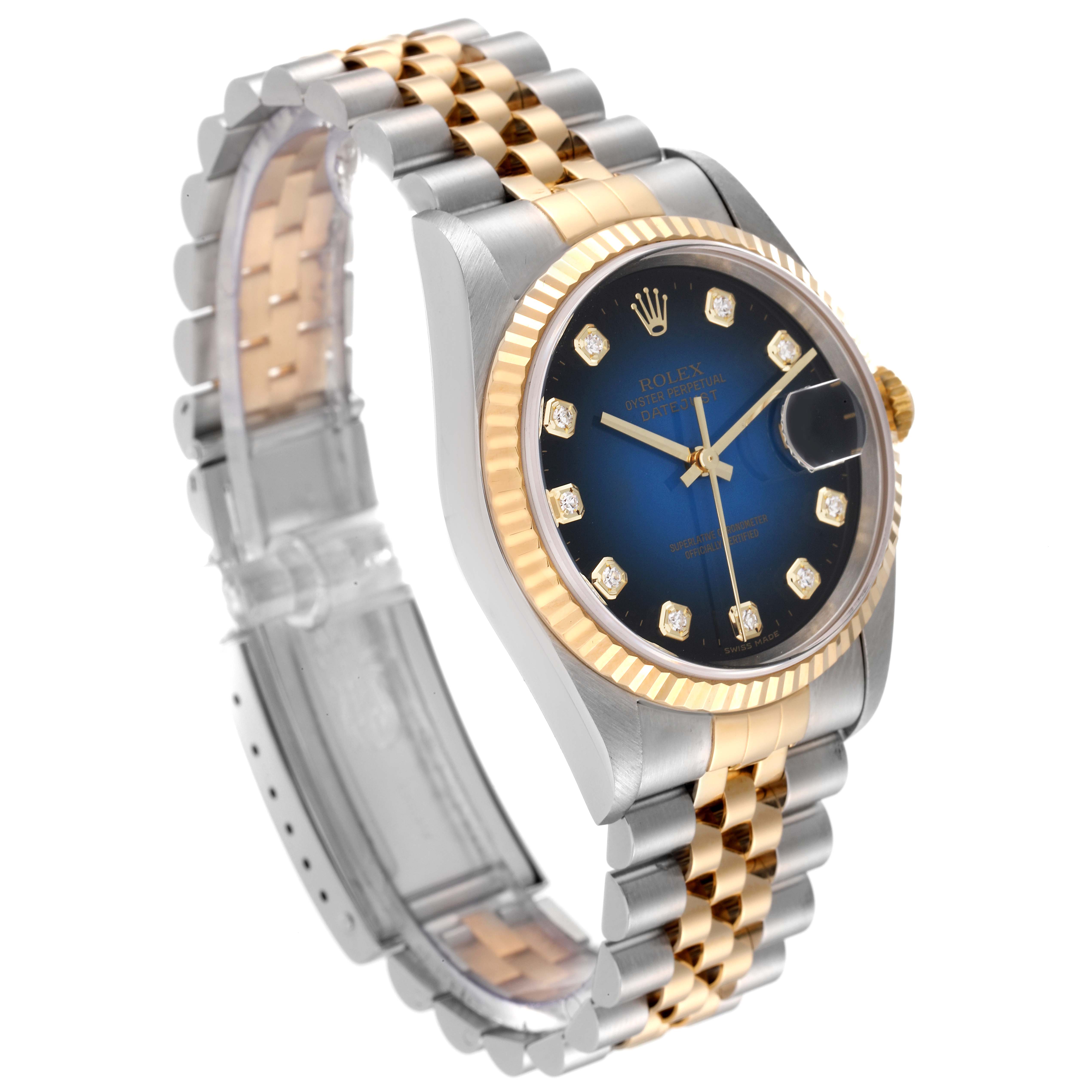 This image shows a side angle of a Rolex Datejust 16233 Men's Steel and Gold (two tone) Blue Dial 16233 Men's Steel and Gold (two tone) Blue Dial watch, highlighting its blue dial, gold fluted bezel, and two-tone bracelet.