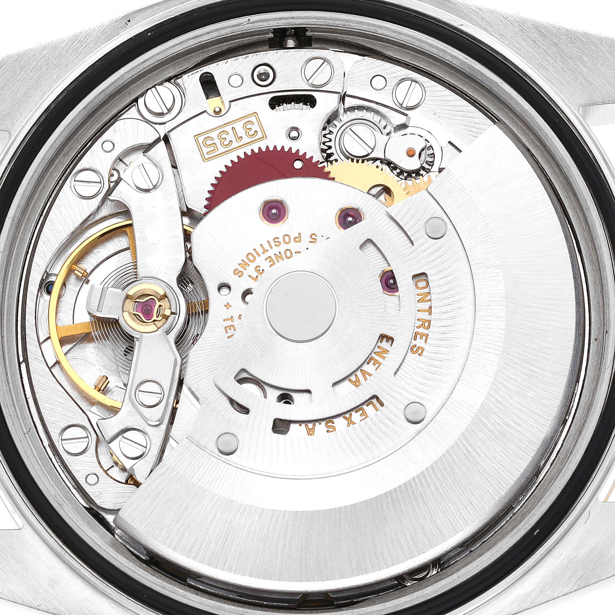 The image shows a detailed view of the movement and internal mechanism of a Rolex Datejust 16233 Men's Steel and Gold (two tone) Blue Dial 16233 Men's Steel and Gold (two tone) Blue Dial watch.