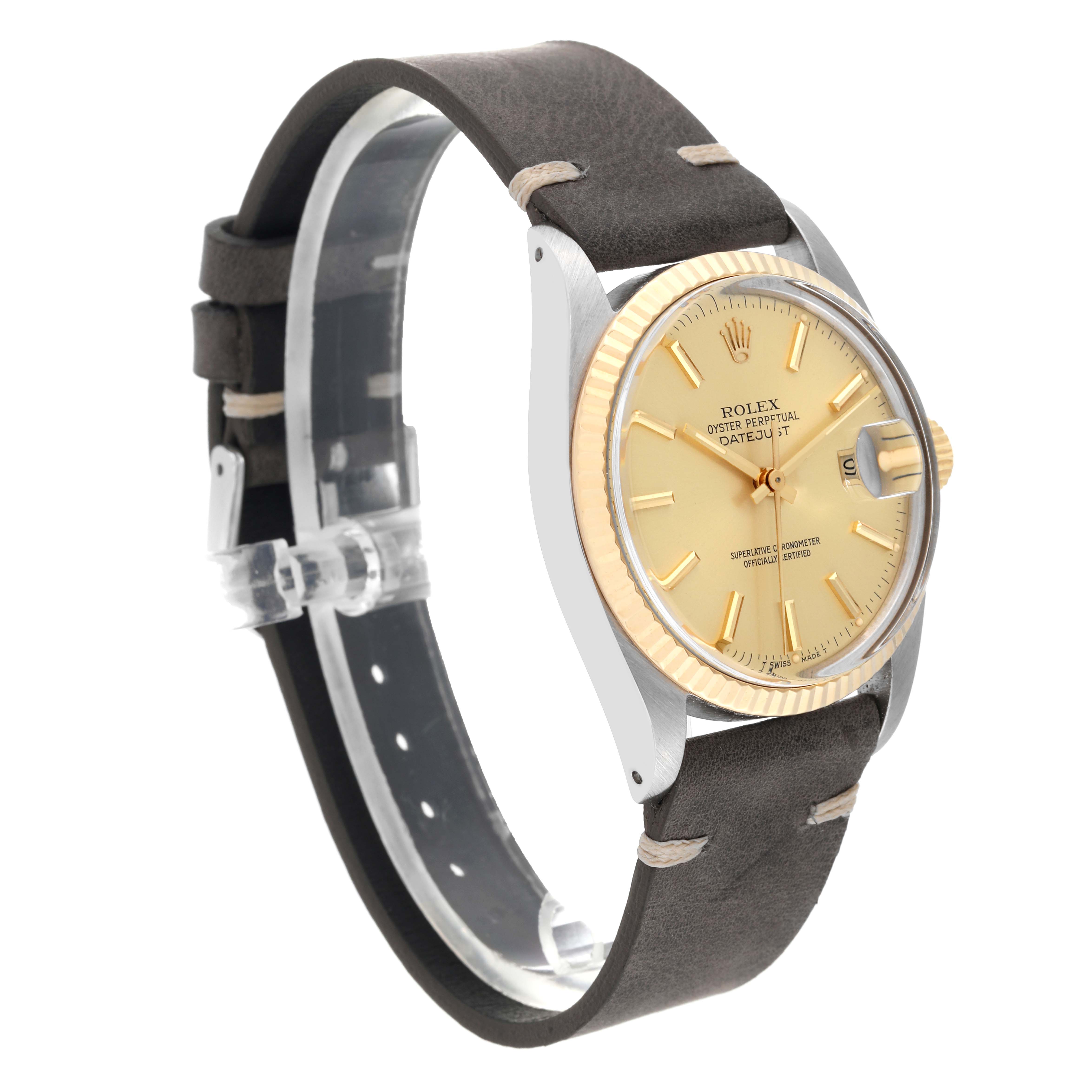 This Rolex Vintage Collection 16013 Men's Steel and Gold (two tone) Champagne Dial 16013 Men's Steel and Gold (two tone) Champagne Dial model is shown at an angle that displays the dial, bezel, case, and strap.