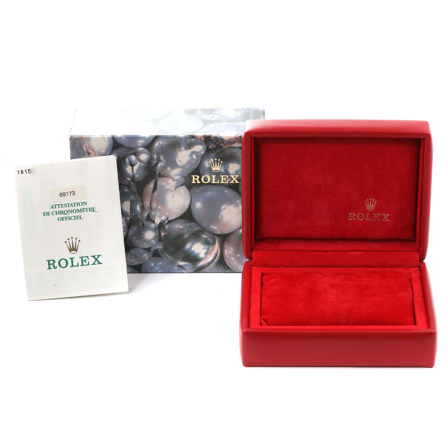 This image shows the packaging and a booklet for a Rolex Datejust 69173 Women's Steel and Gold (two tone) White Dial 69173 Women's Steel and Gold (two tone) White Dial watch, including a red watch box and an official certificate.