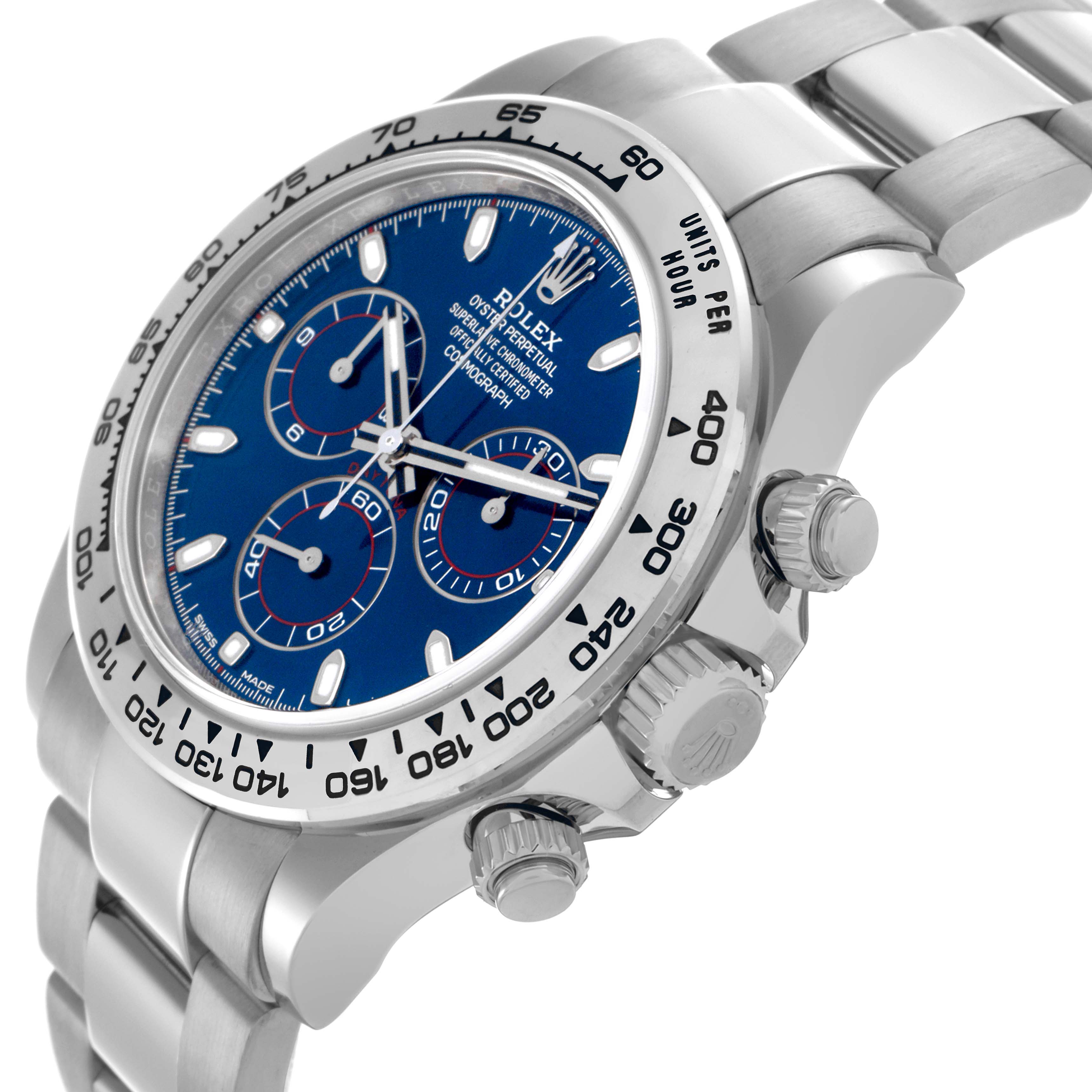 The Rolex Daytona 116509 Men
s White Gold Blue Dial 116509 Men
s White Gold Blue Dial watch is shown at an angle highlighting the blue dial, bezel, crown, and pushers.