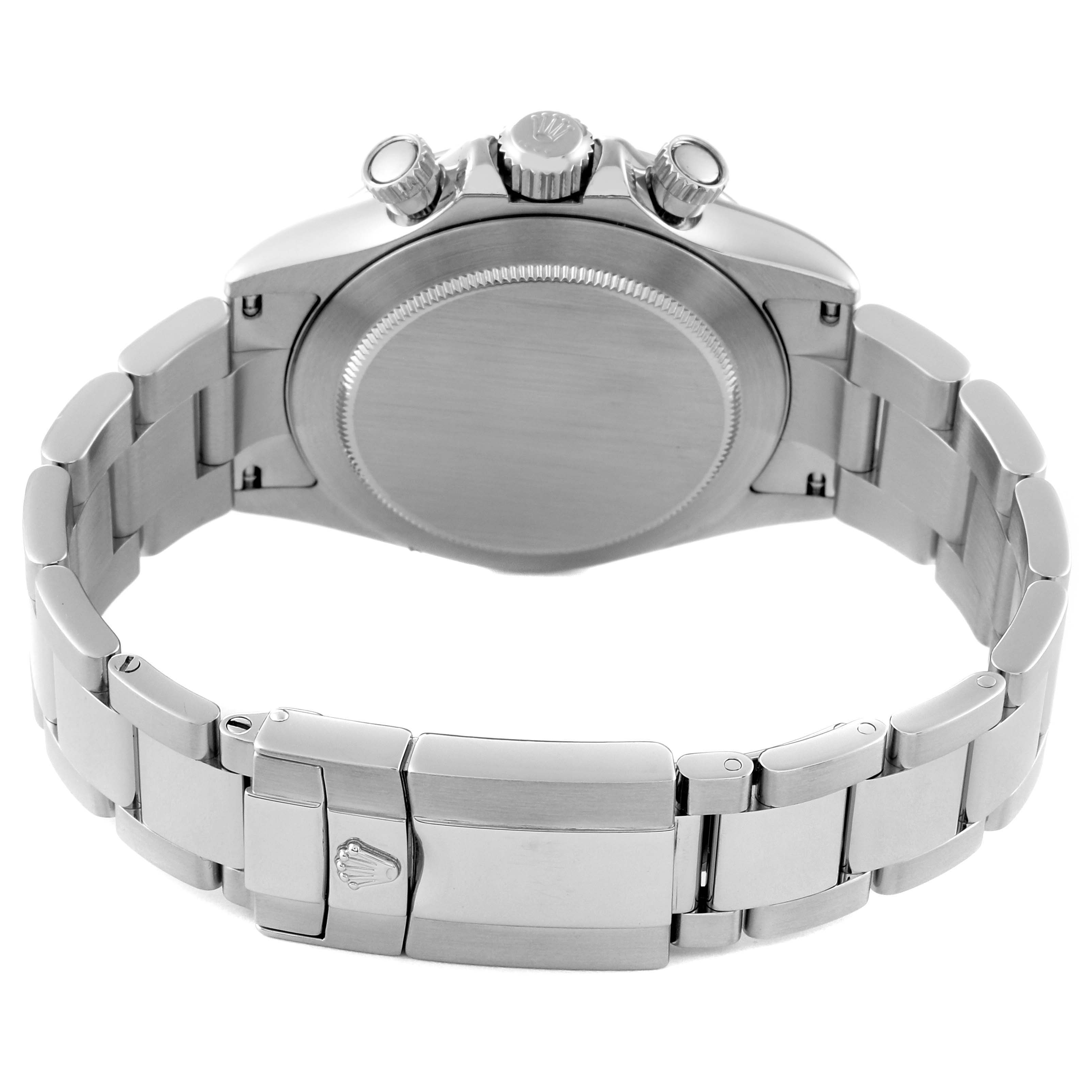 The image shows the back view of a Rolex Daytona 116520 Men's Stainless Steel Black Dial 116520 Men's Stainless Steel Black Dial watch, including its case back, bracelet, and clasp.