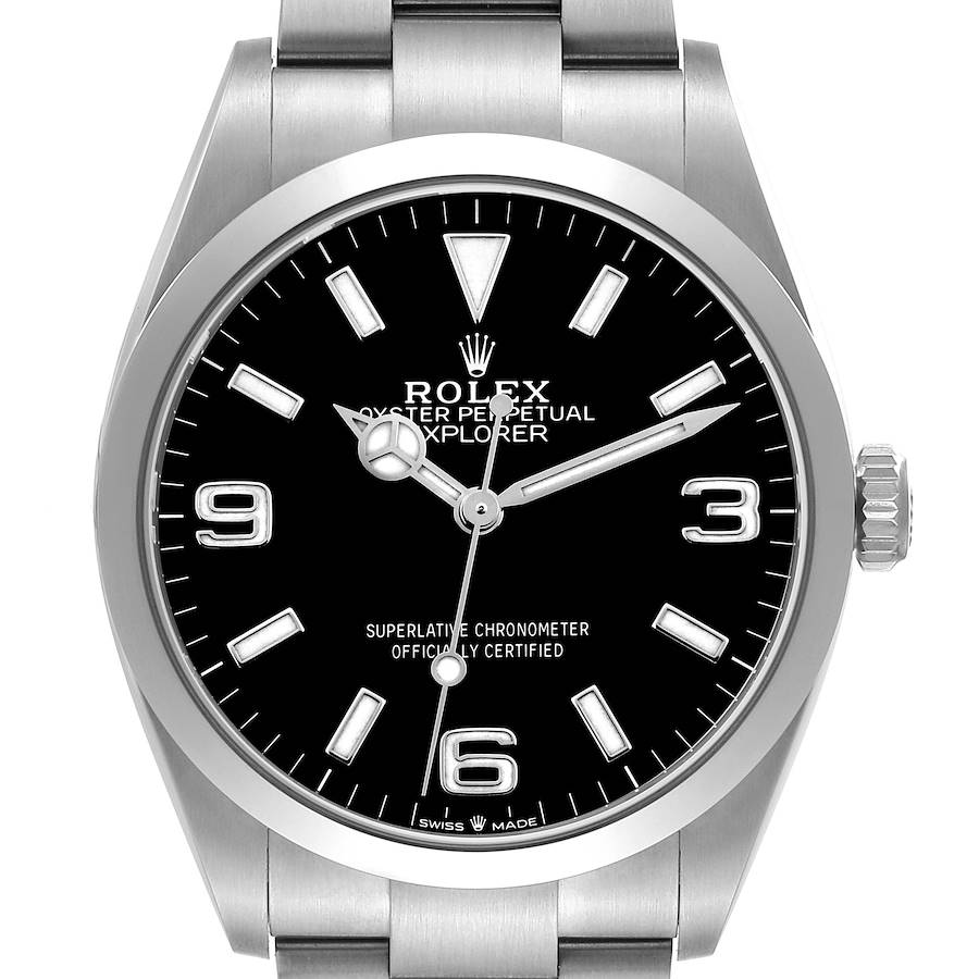 The Rolex Explorer watch is shown from a front angle, highlighting the dial, bezel, and bracelet.