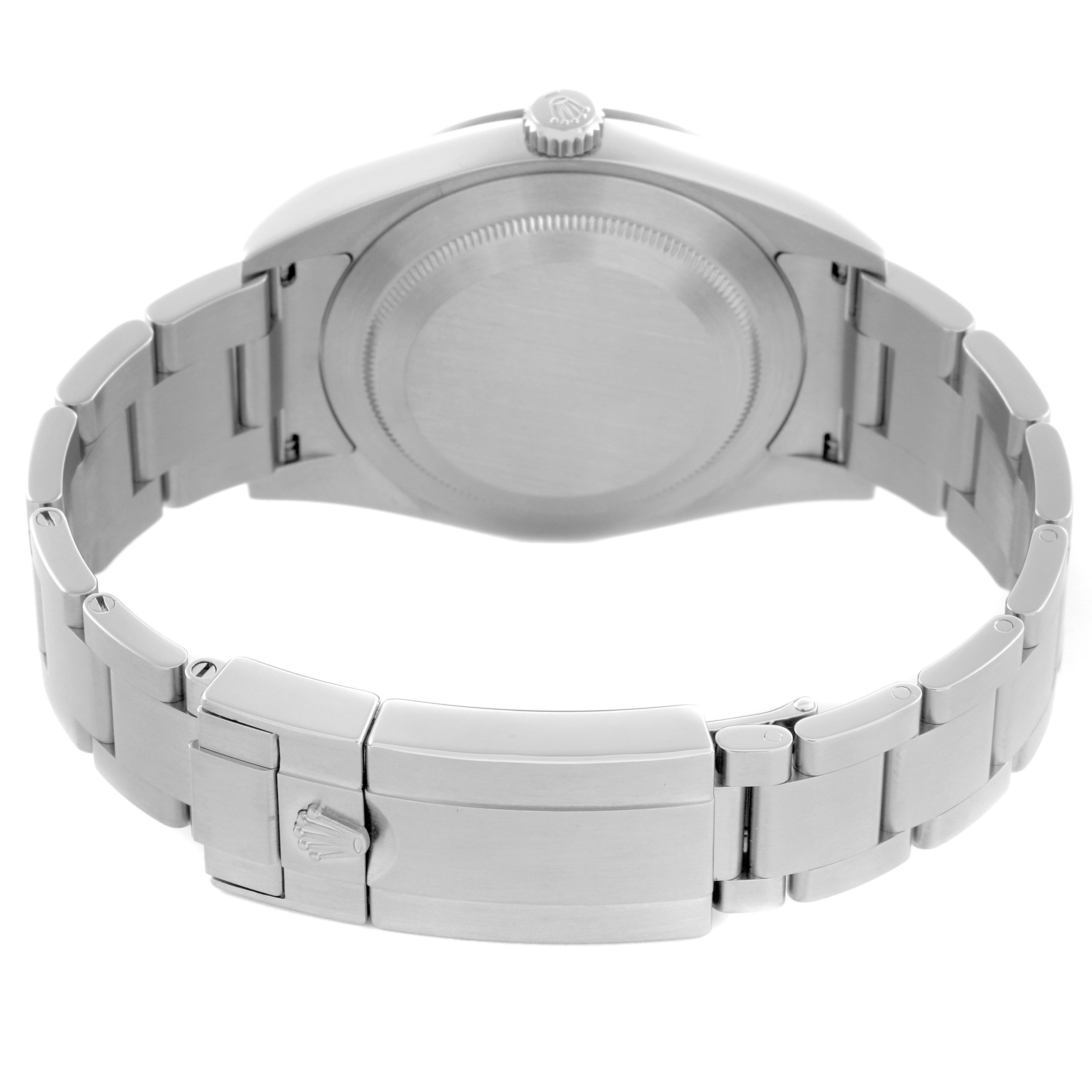 The image shows the back of a Rolex Explorer 214270 Men
s Stainless Steel Black Dial 214270 Men
s Stainless Steel Black Dial watch, highlighting the case back, crown, and bracelet clasp.