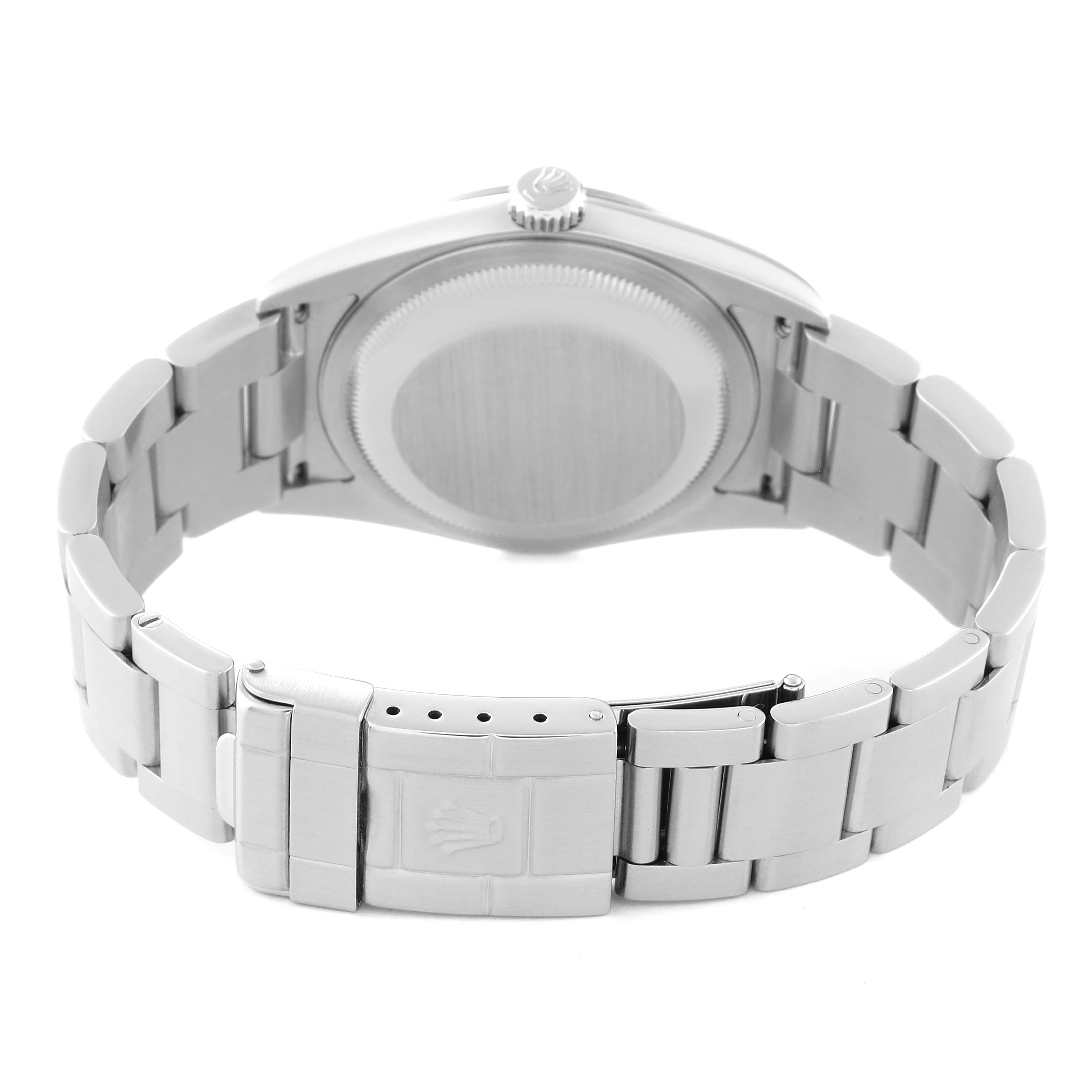 The image shows the back view of a Rolex Explorer 114270 Men
s Stainless Steel Black Dial 114270 Men
s Stainless Steel Black Dial watch, highlighting the caseback, bracelet, and clasp.