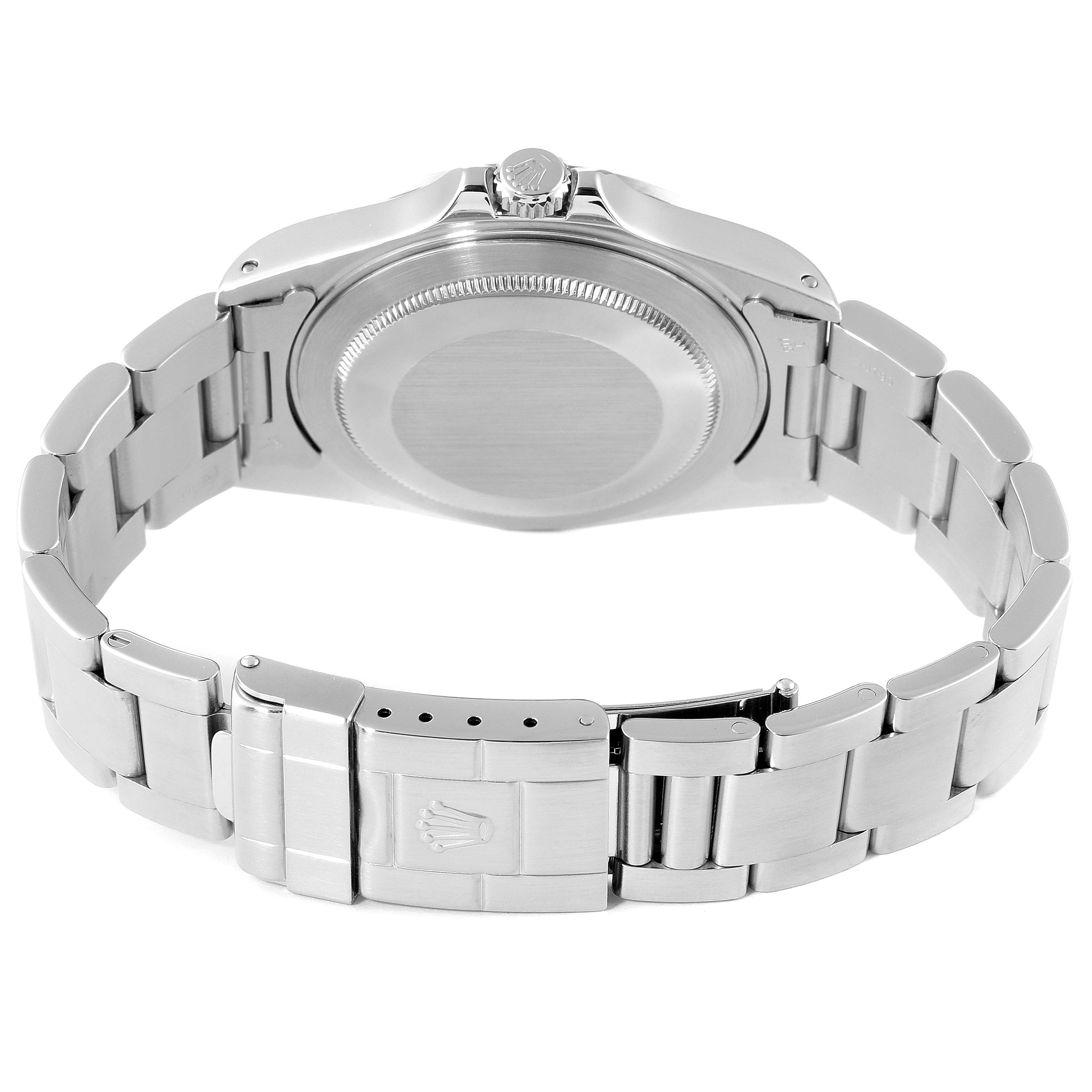 The image shows the back view of a Rolex Explorer 16570 Men's Stainless Steel White Dial 16570 Men's Stainless Steel White Dial watch, highlighting its clasp, bracelet, and case back.