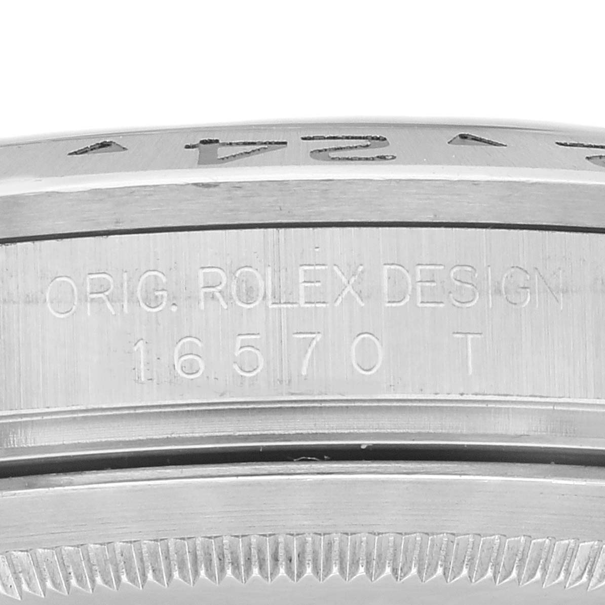 The image shows a close-up of the side of the Rolex Explorer 16570 Men's Stainless Steel Black Dial 16570 Men's Stainless Steel Black Dial watch case, highlighting the engraved model number and "ORIG. ROLEX DESIGN."