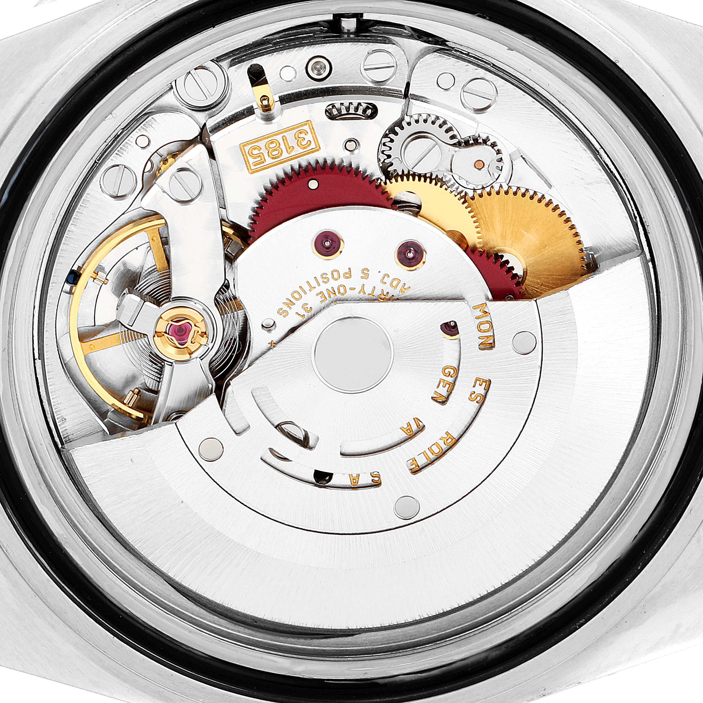 This image shows a close-up of the movement mechanism inside a Rolex GMT-Master 16713 Men's Steel and Gold (two tone) Black Dial 16713 Men's Steel and Gold (two tone) Black Dial watch.