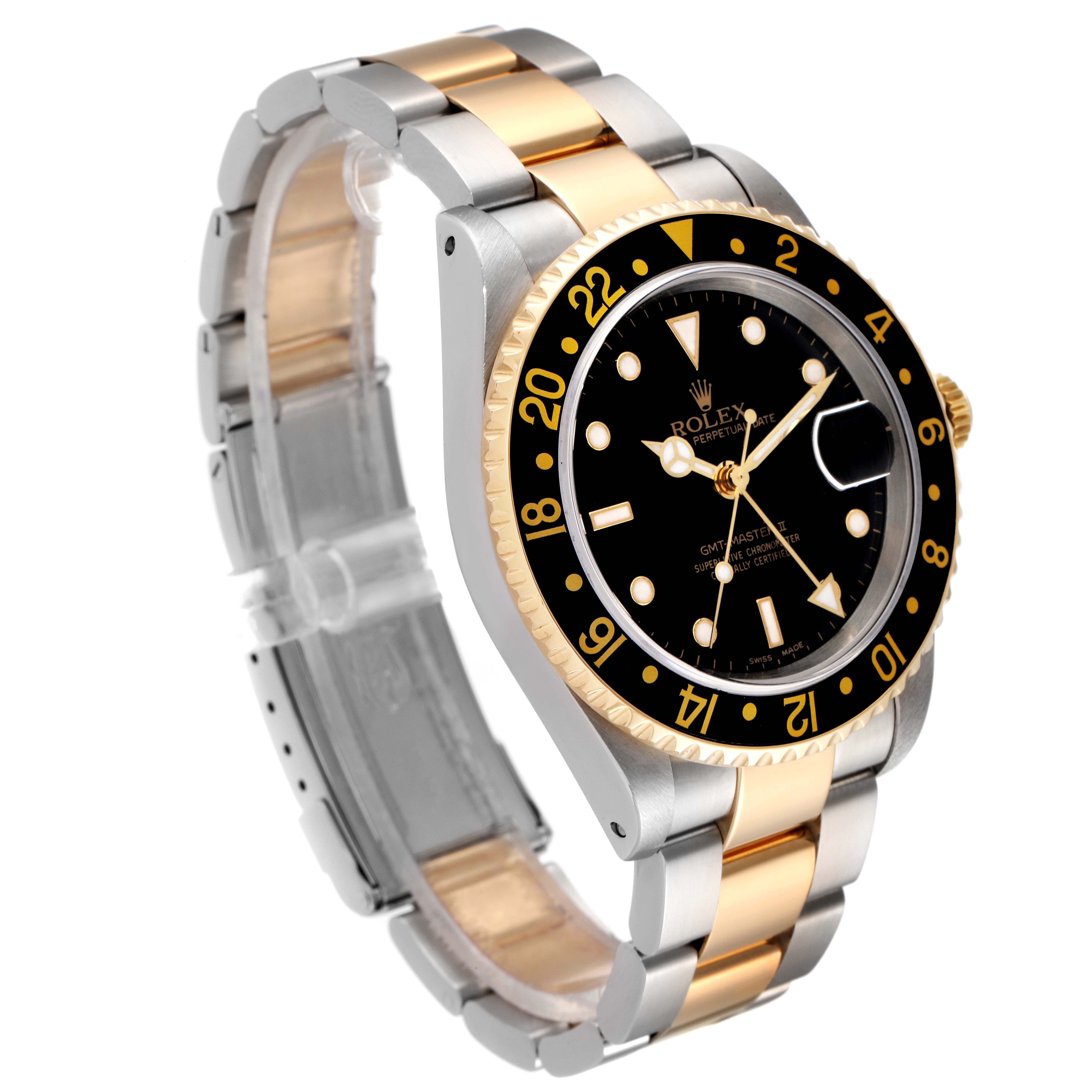 The Rolex GMT-Master 16713 Men's Steel and Gold (two tone) Black Dial 16713 Men's Steel and Gold (two tone) Black Dial watch is shown at an angle highlighting the bezel, dial, crown, and two-tone bracelet.