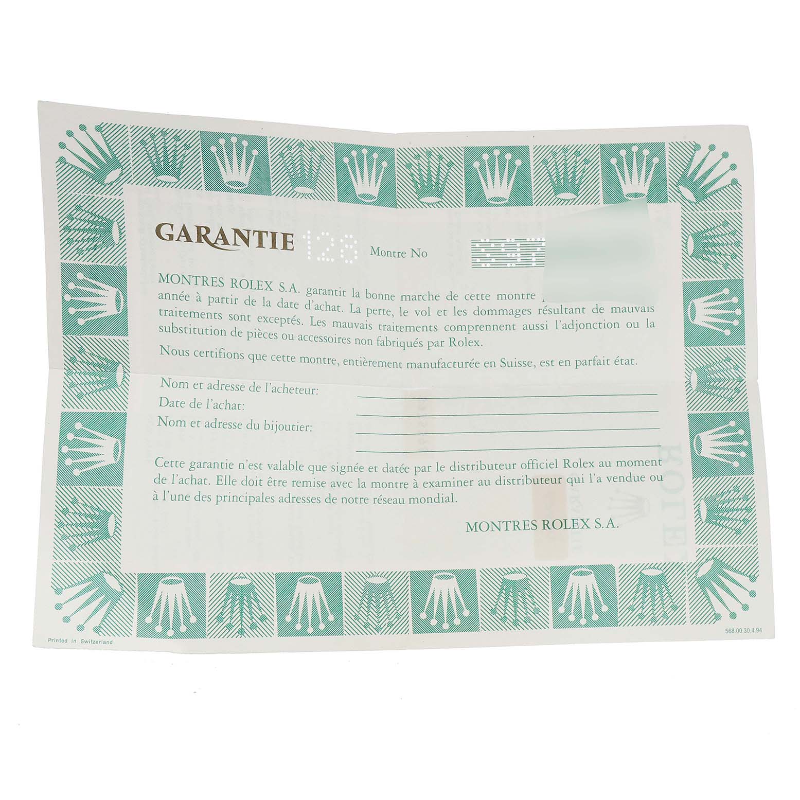 This image shows a guarantee document for a Mid-Size Rolex watch, laid out flat and viewed from above.