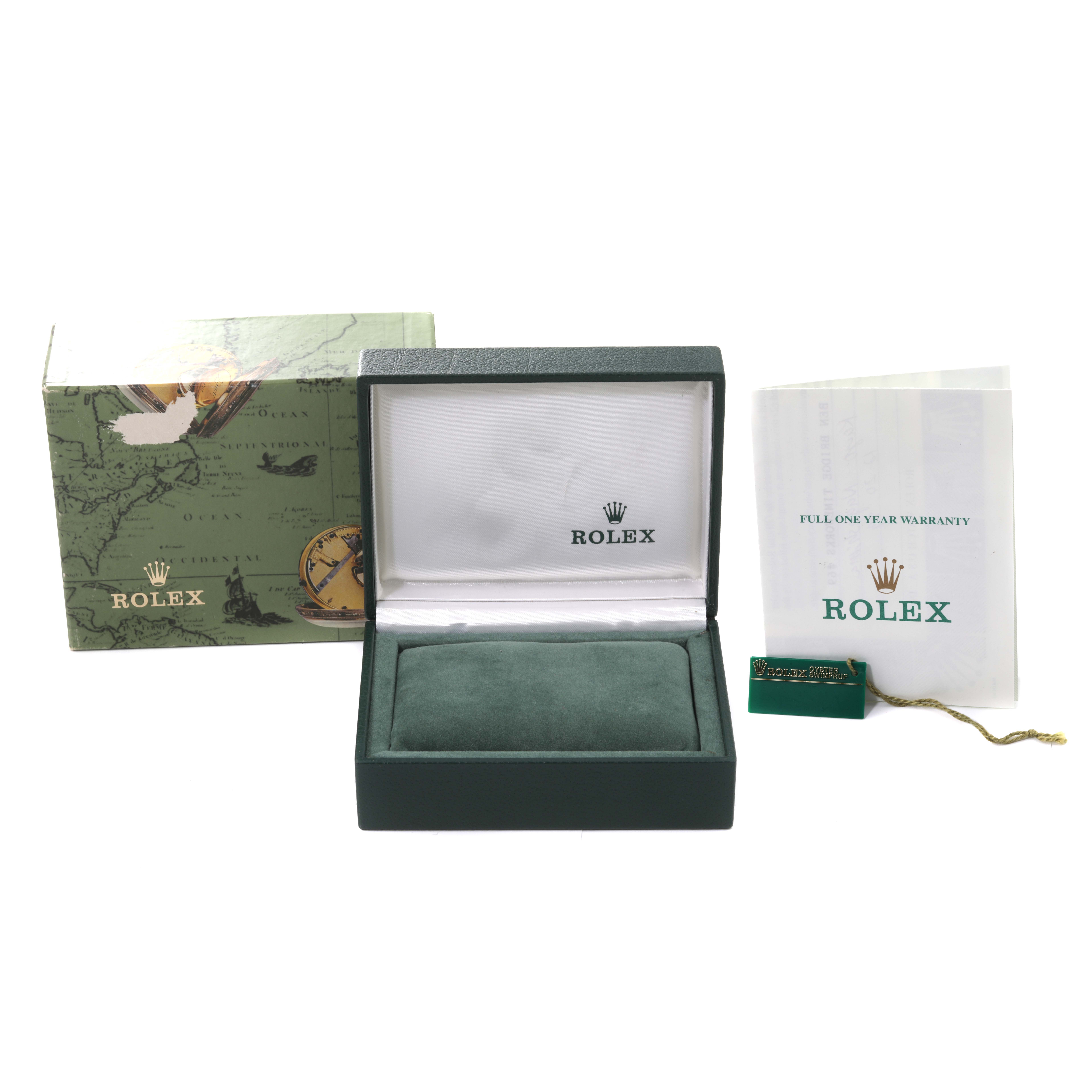 This image shows an empty Rolex Oyster Perpetual 76094 Women's Stainless Steel Pink Dial 76094 Women's Stainless Steel Pink Dial watch box, warranty booklet, and hang tag from a front angle.