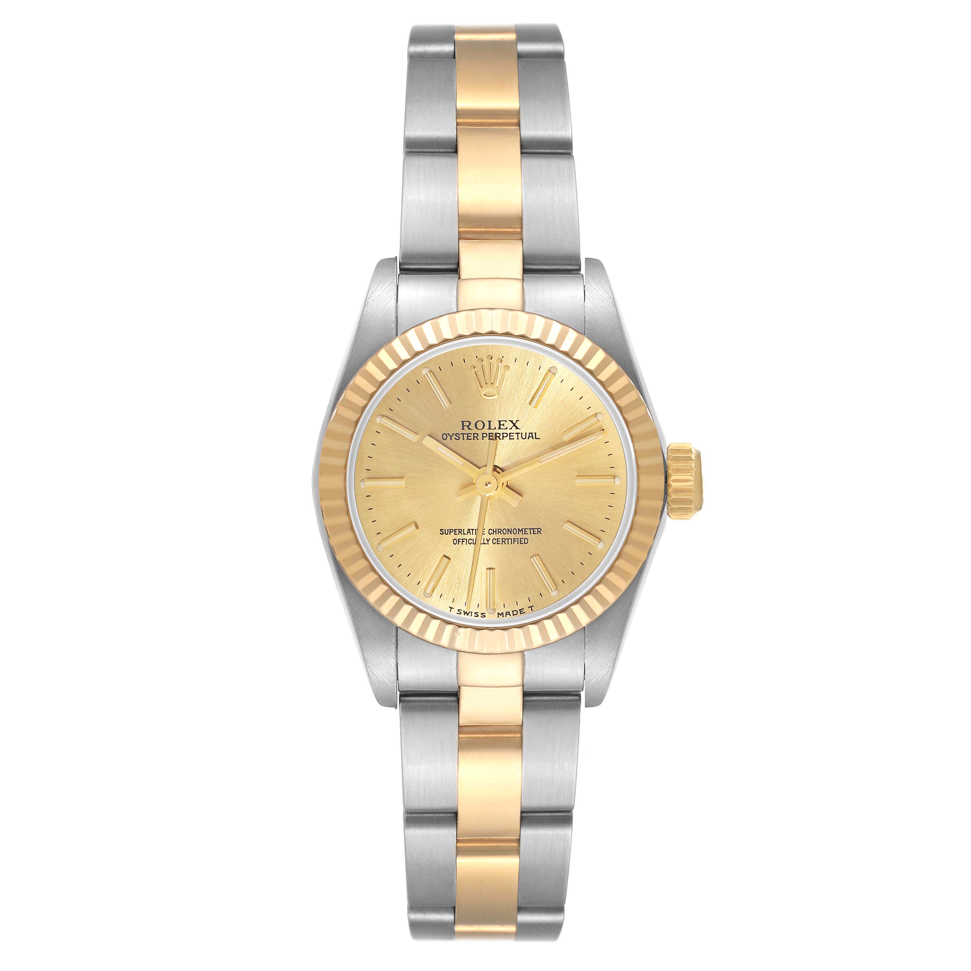 This is a front view of a Rolex Oyster Perpetual 67193 Women's Steel and Gold (two tone) Champagne Dial 67193 Women's Steel and Gold (two tone) Champagne Dial watch showcasing its two-tone bracelet and gold dial.