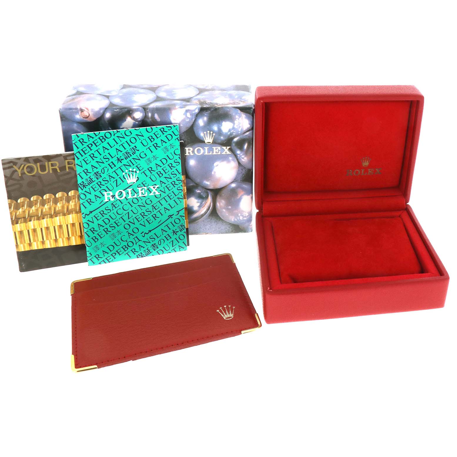 The image shows packaging and accessories for the Rolex President 68288 Women
s Yellow Gold Champagne Dial 68288 Women
s Yellow Gold Champagne Dial model, including a watch box, booklets, and a cardholder.