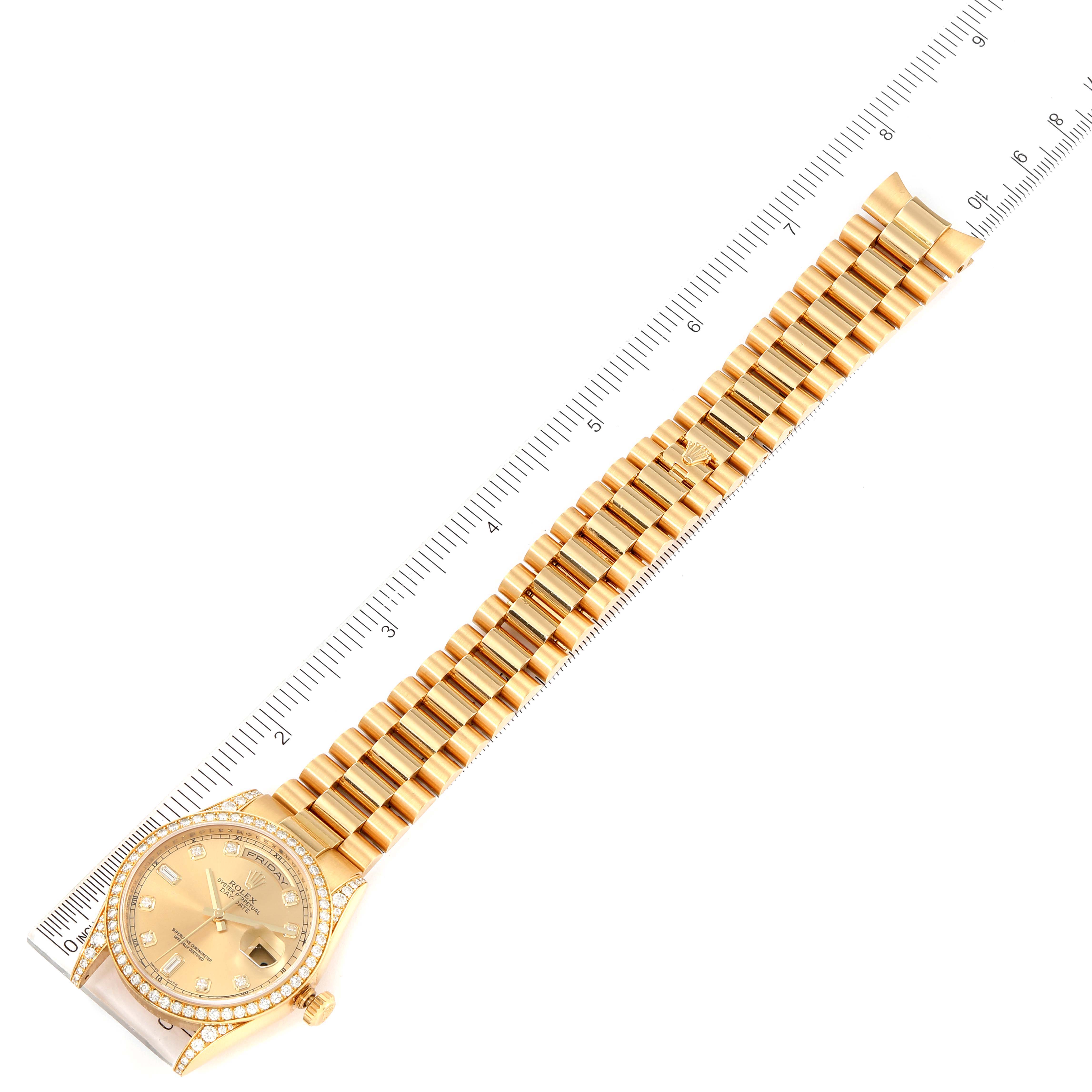 This image shows a Rolex President 118388 Men's Yellow Gold Champagne Dial 118388 Men's Yellow Gold Champagne Dial model watch laid flat with its bracelet fully extended next to a ruler for measurement.