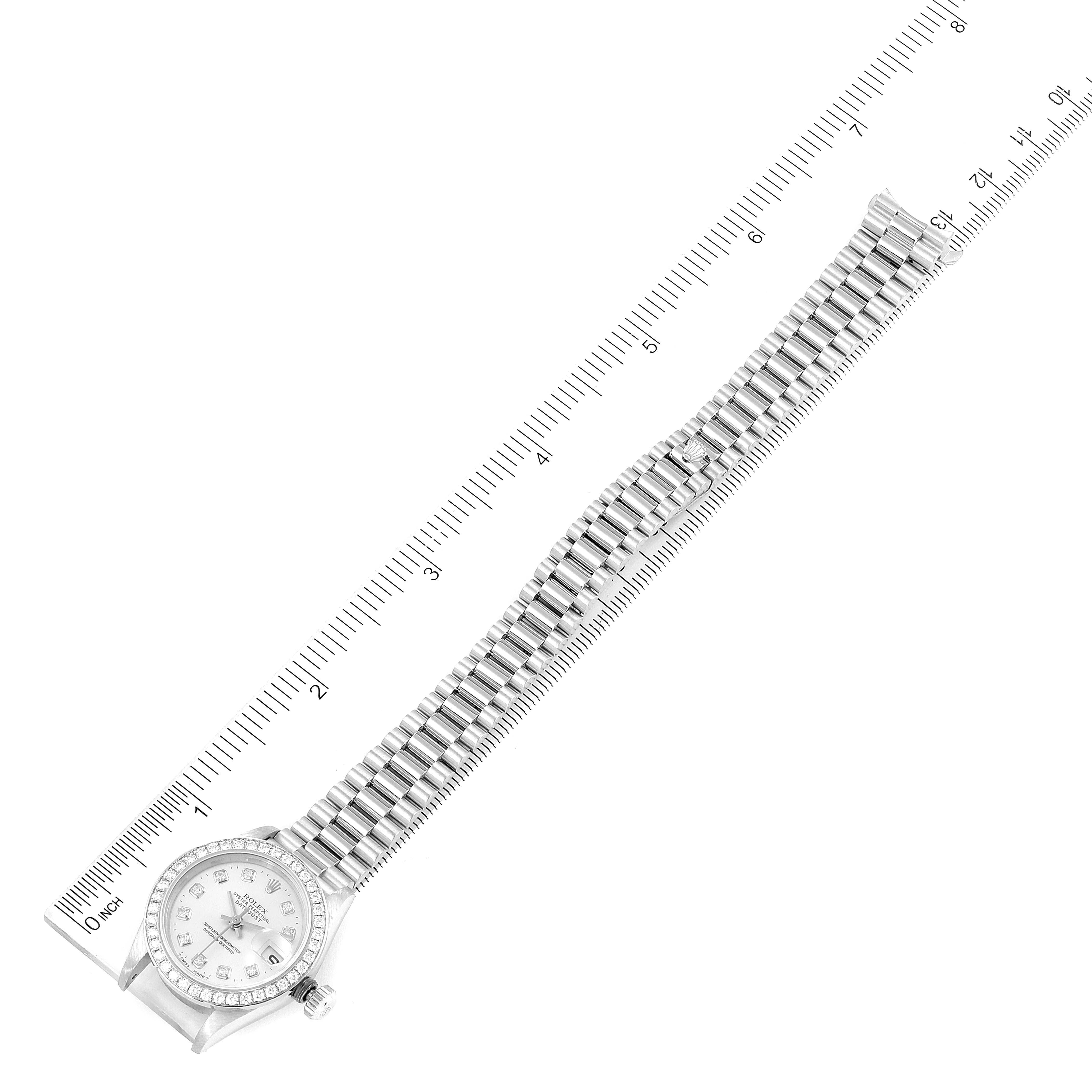 The image shows a top view of a Rolex President 69136 Women's Platinum Silver Dial 69136 Women's Platinum Silver Dial model watch, including the face, bezel, and full length of the bracelet with ruler measurements.