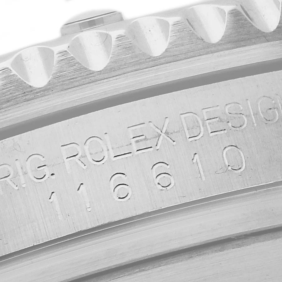This close-up image shows the engraved model number on the side of the case of a Rolex Submariner 116610 Men
s Stainless Steel Black Dial 116610 Men
s Stainless Steel Black Dial watch.