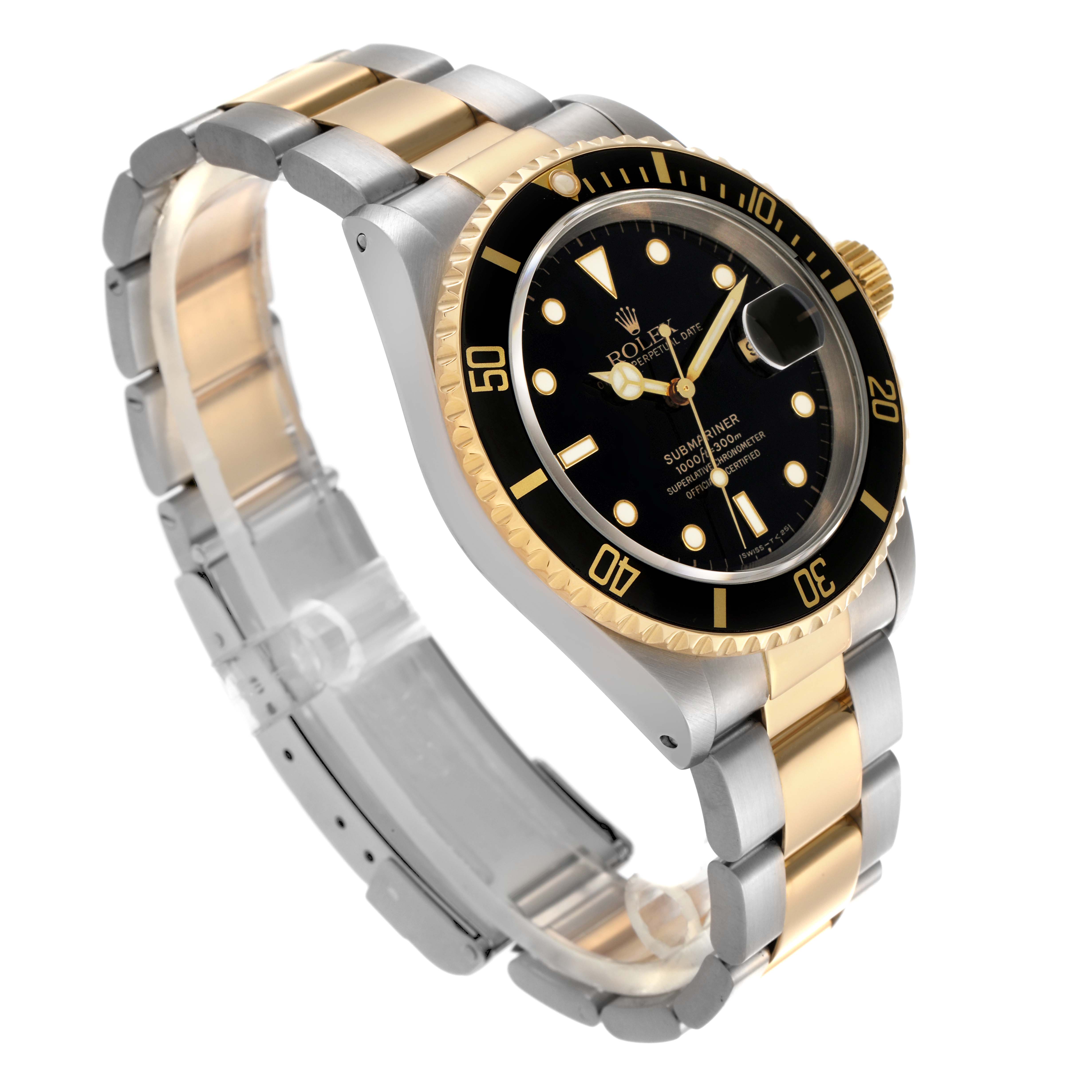 The Rolex Submariner 16613 Men
s Steel and Gold (two tone) Black Dial 16613 Men
s Steel and Gold (two tone) Black Dial is shown at a three-quarter angle, highlighting its gold and silver bracelet, black dial, and bezel.
