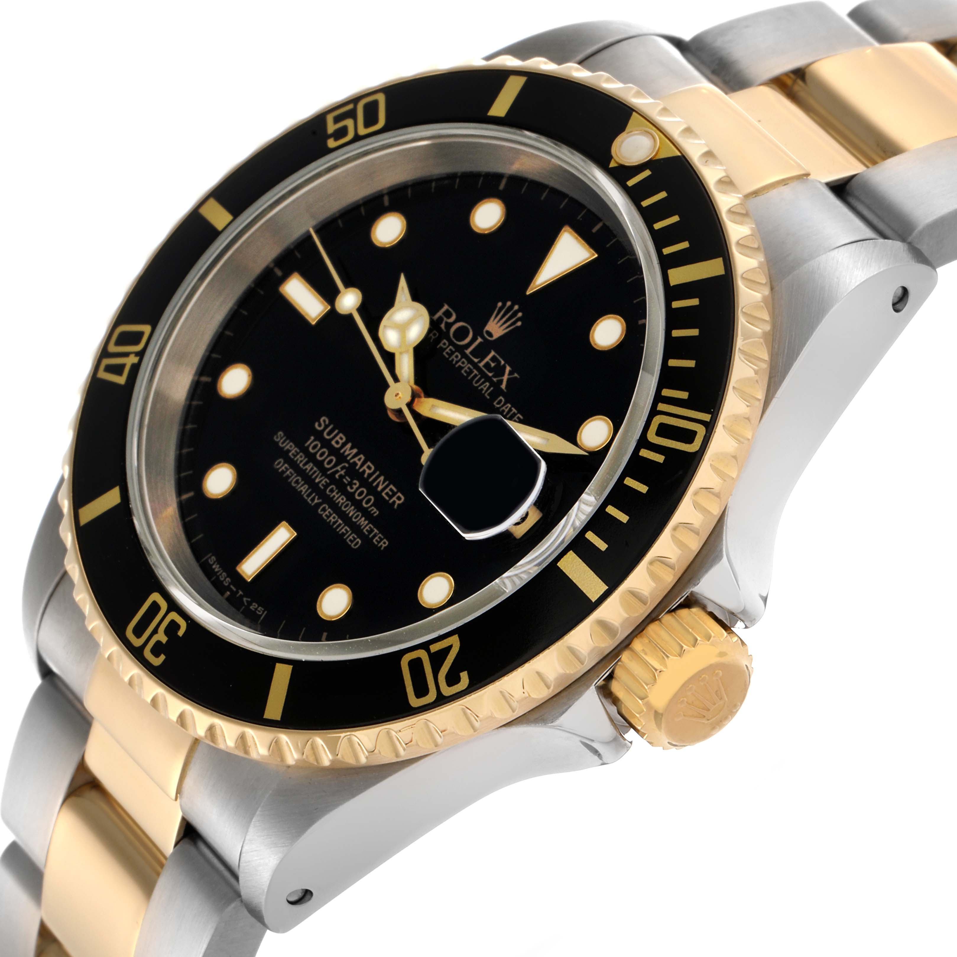 The image shows a Rolex Submariner 16613 Men
s Steel and Gold (two tone) Black Dial 16613 Men
s Steel and Gold (two tone) Black Dial at an angled side view, highlighting the bezel, dial, and crown.