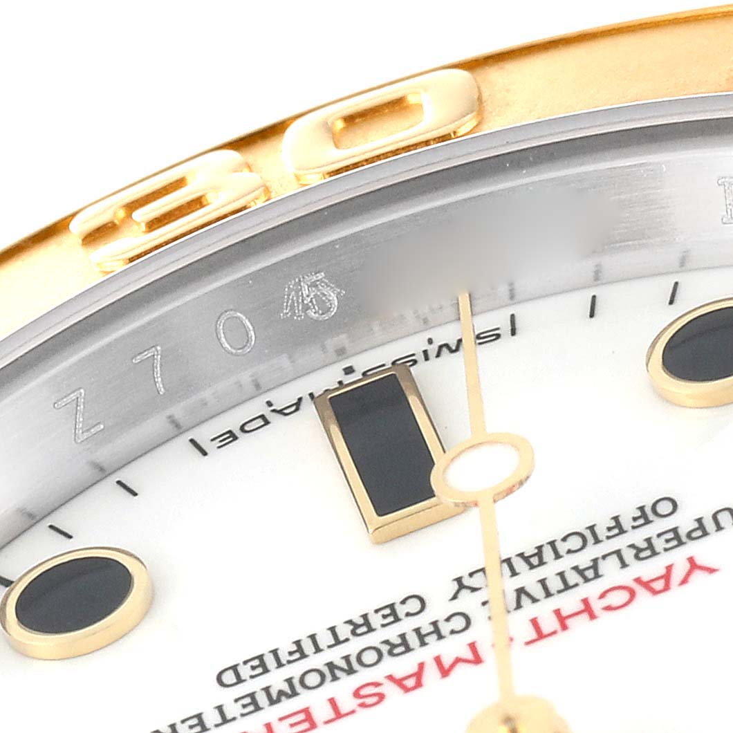 The image shows a close-up angle of the dial and bezel for the Yacht-Master model by Rolex.