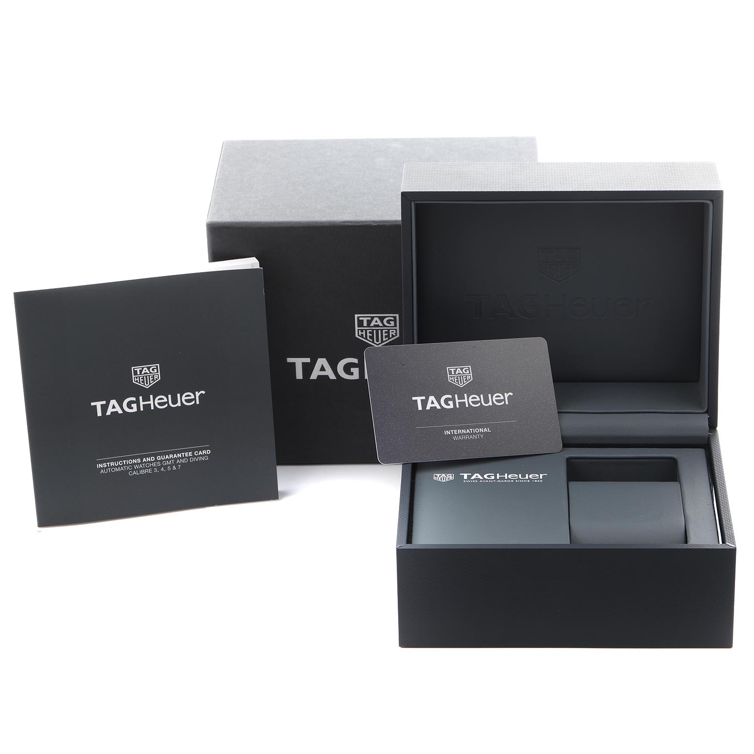 The image shows the Tag Heuer Aquaracer WBP201F Men
s Stainless Steel Orange Dial WBP201F Men
s Stainless Steel Orange Dial packaging, including the box, instructions, and warranty card, from a front angle.