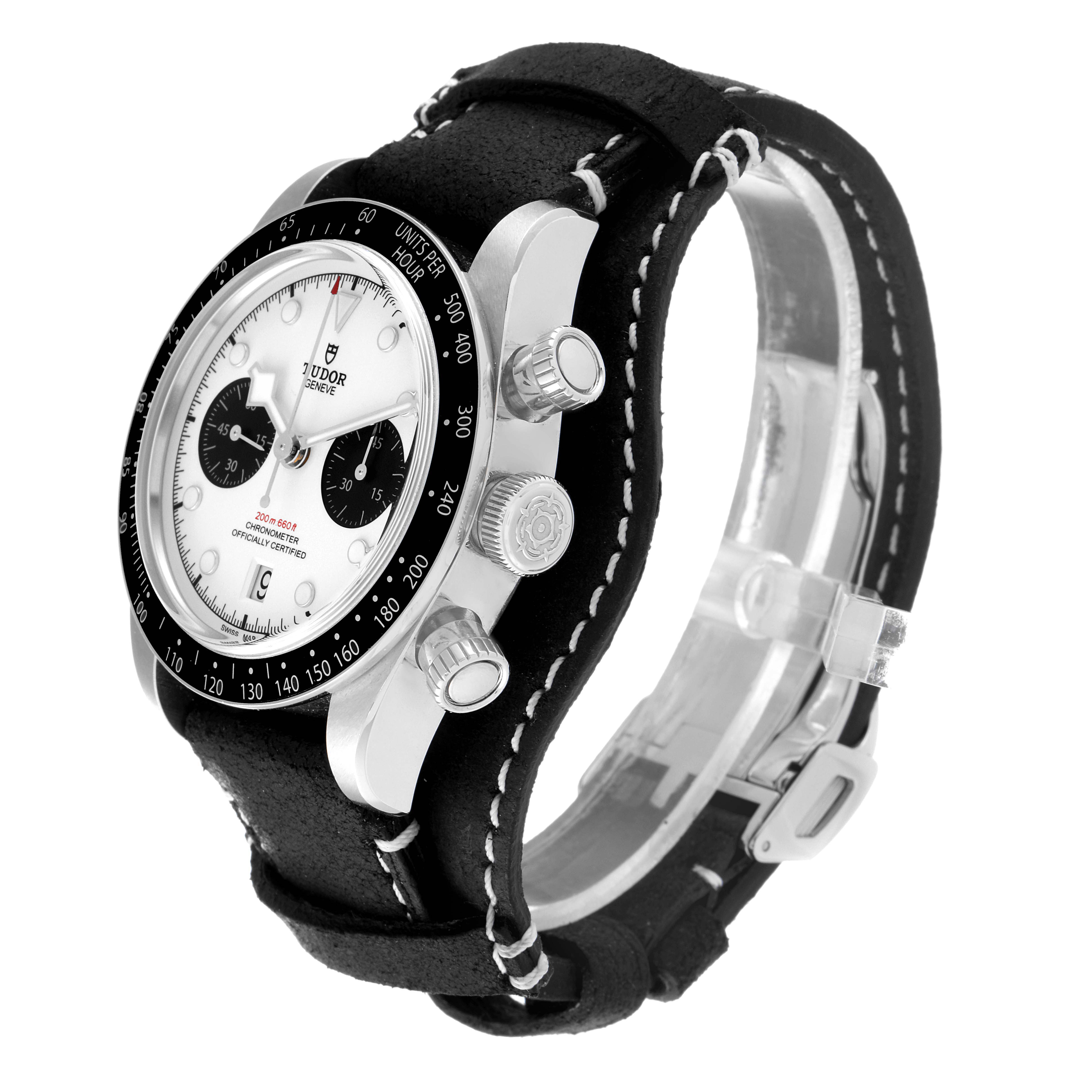 This is a side-angle view of the Tudor Heritage Black Bay 79360N Men
s Stainless Steel White Dial 79360N Men
s Stainless Steel White Dial watch, showcasing its face, bezel, crown, and pushers, along with a black leather strap.